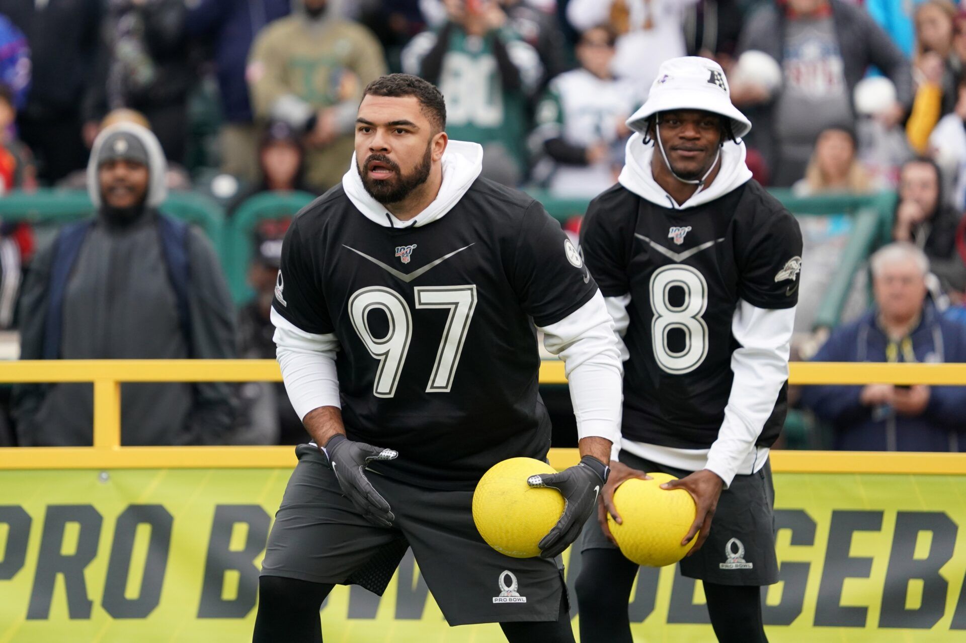 Pittsburgh Steelers defensive tackle Cameron Hayward (97) and Baltimore Ravens quarterback Lamar Jackson (8) during the dodgeball competition at the Pro Bowl Skills Showdown at ESPN Wide World of Sports.