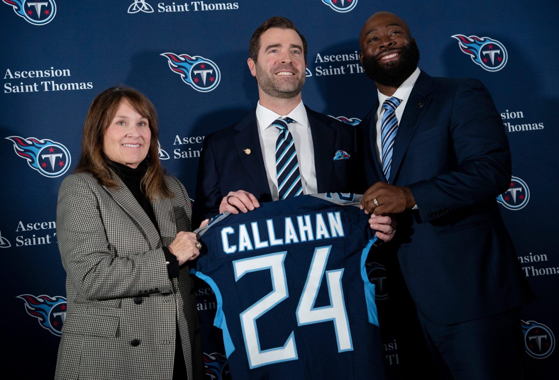 Tennessee Titans owner Amy Adams Strunk, left, Head Coach Brian Callahan, center, and Ran Carthon, general manager, stand for portraits at Ascension Saint Thomas Sports Park in Nashville, Tenn., Thurs...