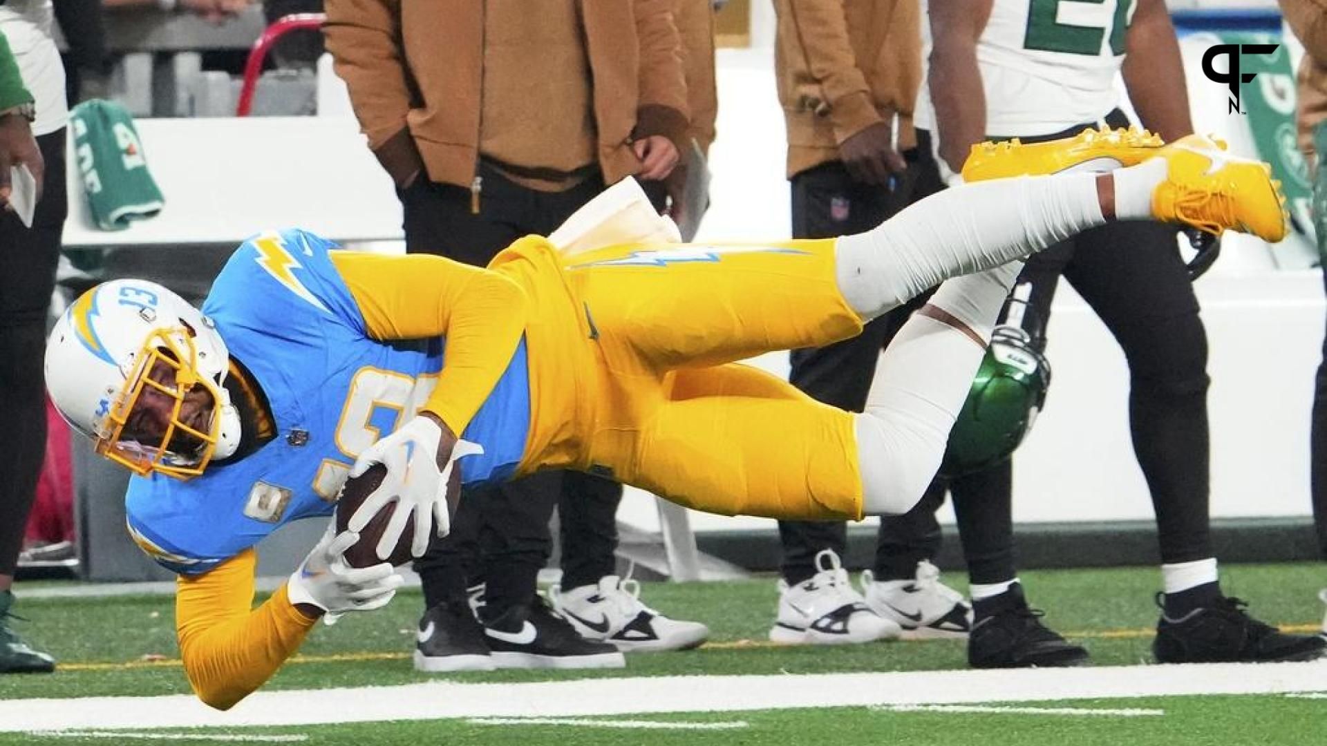 Los Angeles Chargers wide receiver Keenan Allen (13) catches the ball against the New York Jets, surpassing 10,000 career receiving yards during a football game at MetLife Stadium.