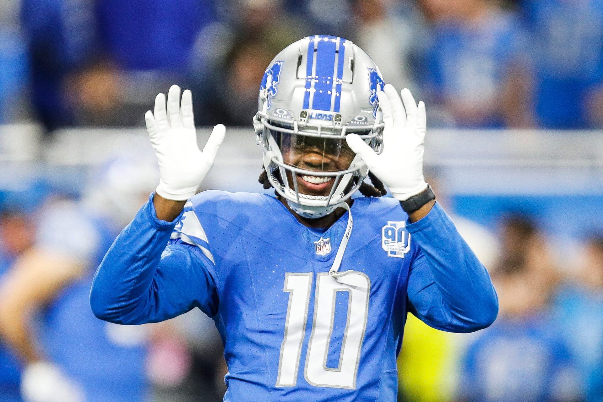 Detroit Lions quarterback Teddy Bridgewater waves to fans during warmups before the Denver Broncos game at Ford Field