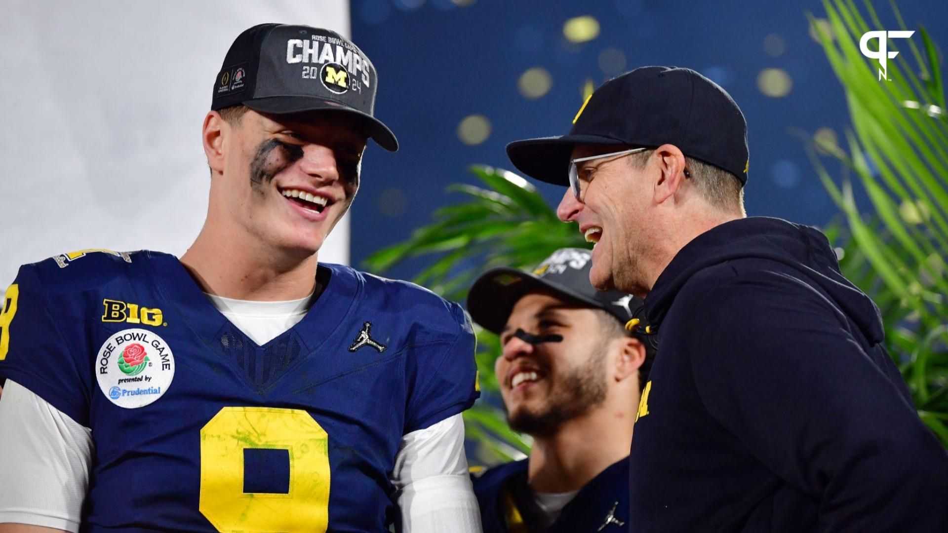 Michigan Wolverines head coach Jim Harbaugh and quarterback J.J. McCarthy (9) celebrate on the podium after defeating the Alabama Crimson Tide in the 2024 Rose Bowl college football playoff semifinal game at Rose Bowl.