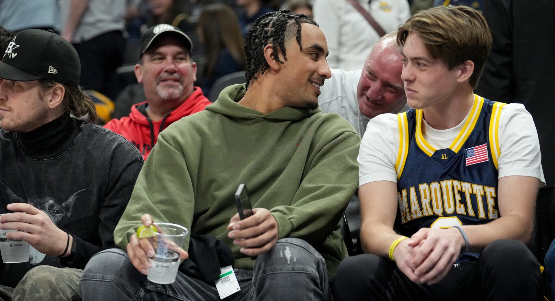 Green Bay Packers quarterback Jordan Love, green hoodie, is shown during the second half of the Marquette 0 Seton Hall men s basketball game