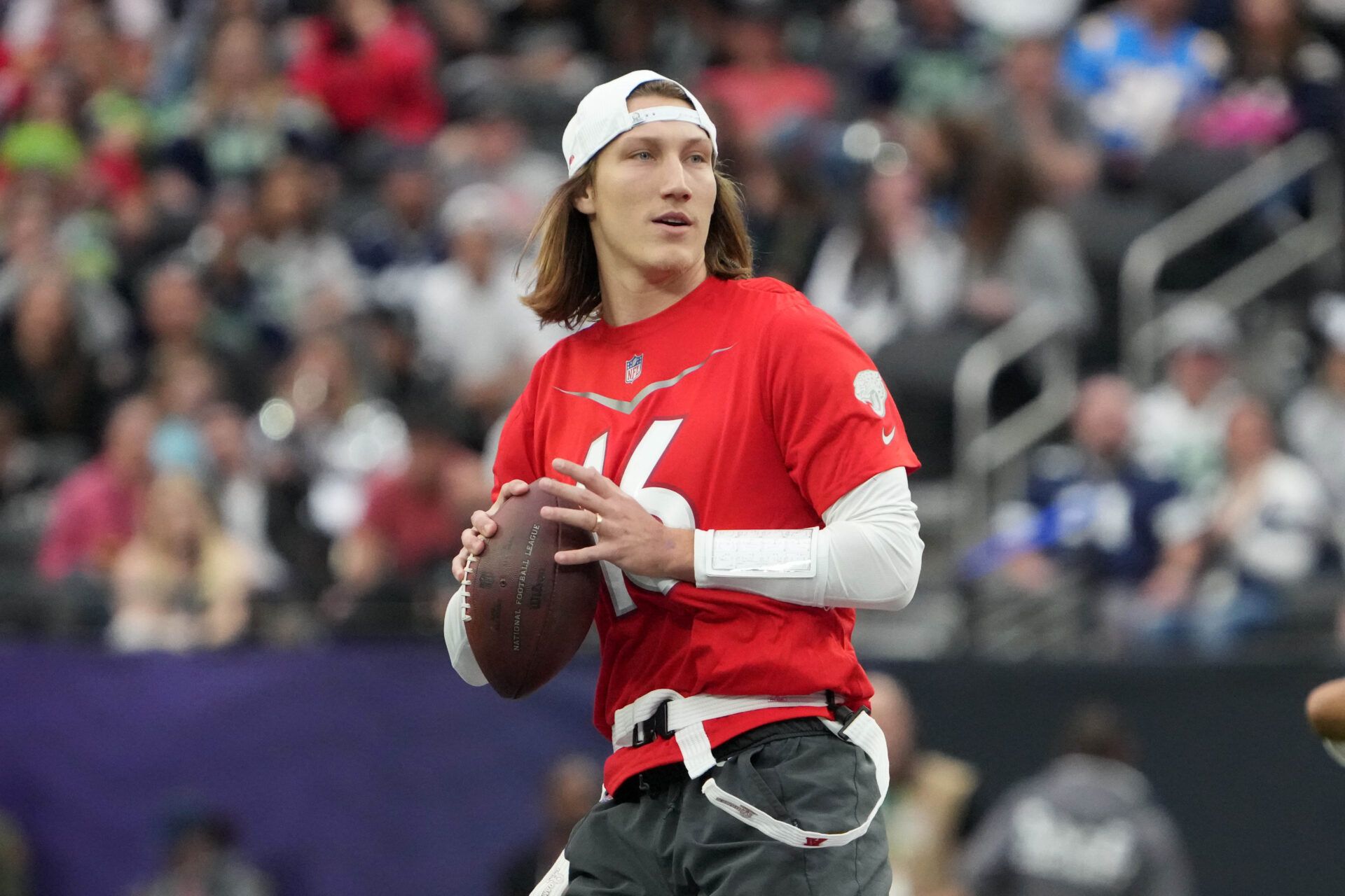 AFC quarterback Trevor Lawrence of the Jacksonville Jaguars (16) throws the ball against the NFC during the Pro Bowl Games at Allegiant Stadium.