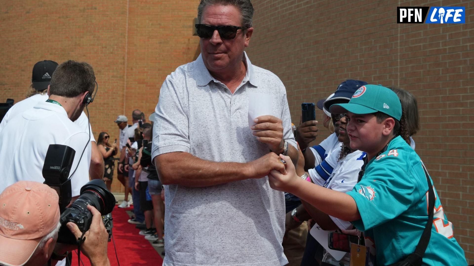 Dan Marino arrives on the red carpet for the 2023 Pro Football Hall of Fame Enshrinement at Tom Benson Hall of Fame Stadium.