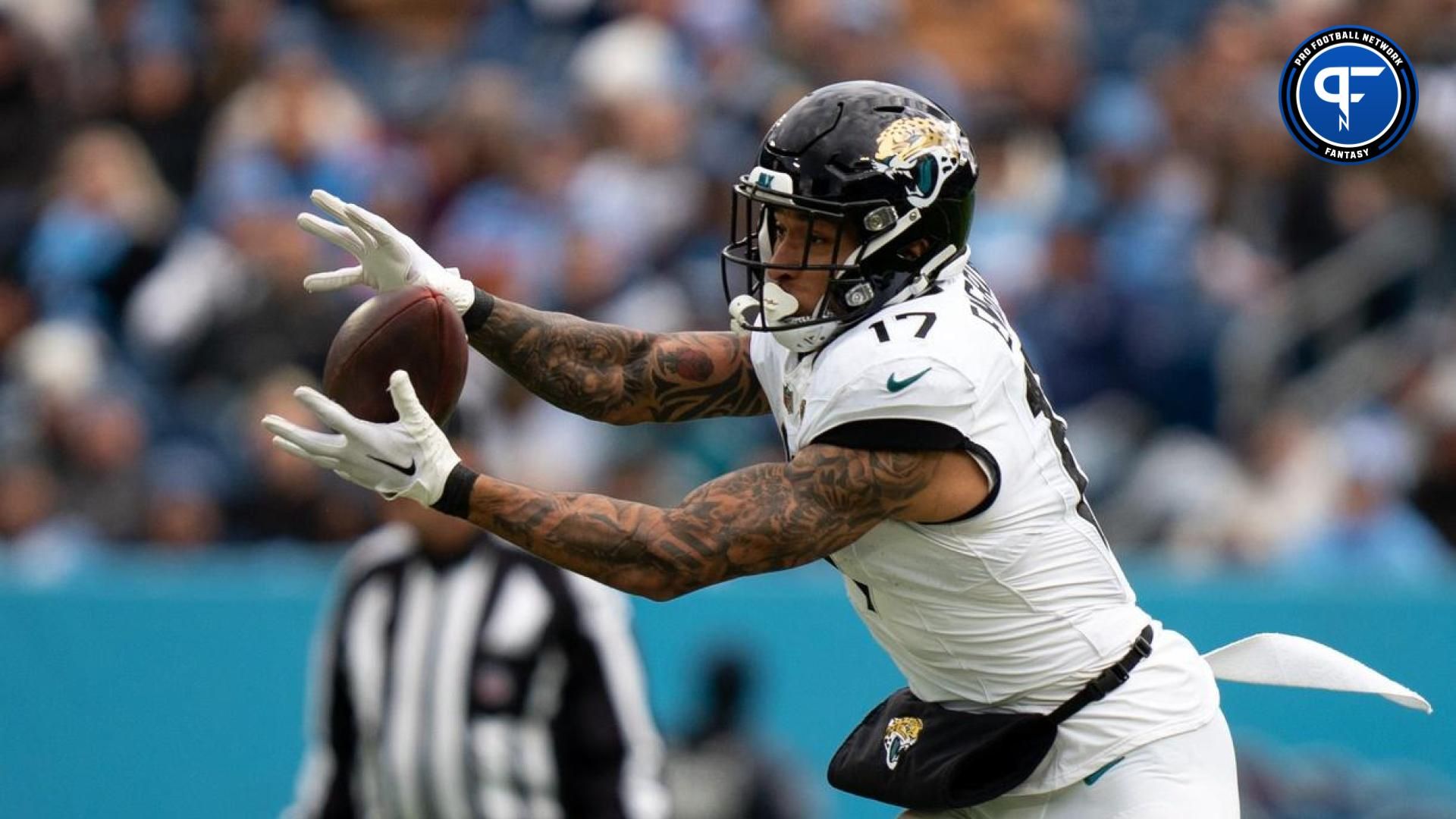 Jacksonville Jaguars TE Evan Engram (17) hauls in a catch against the Tennessee Titans.