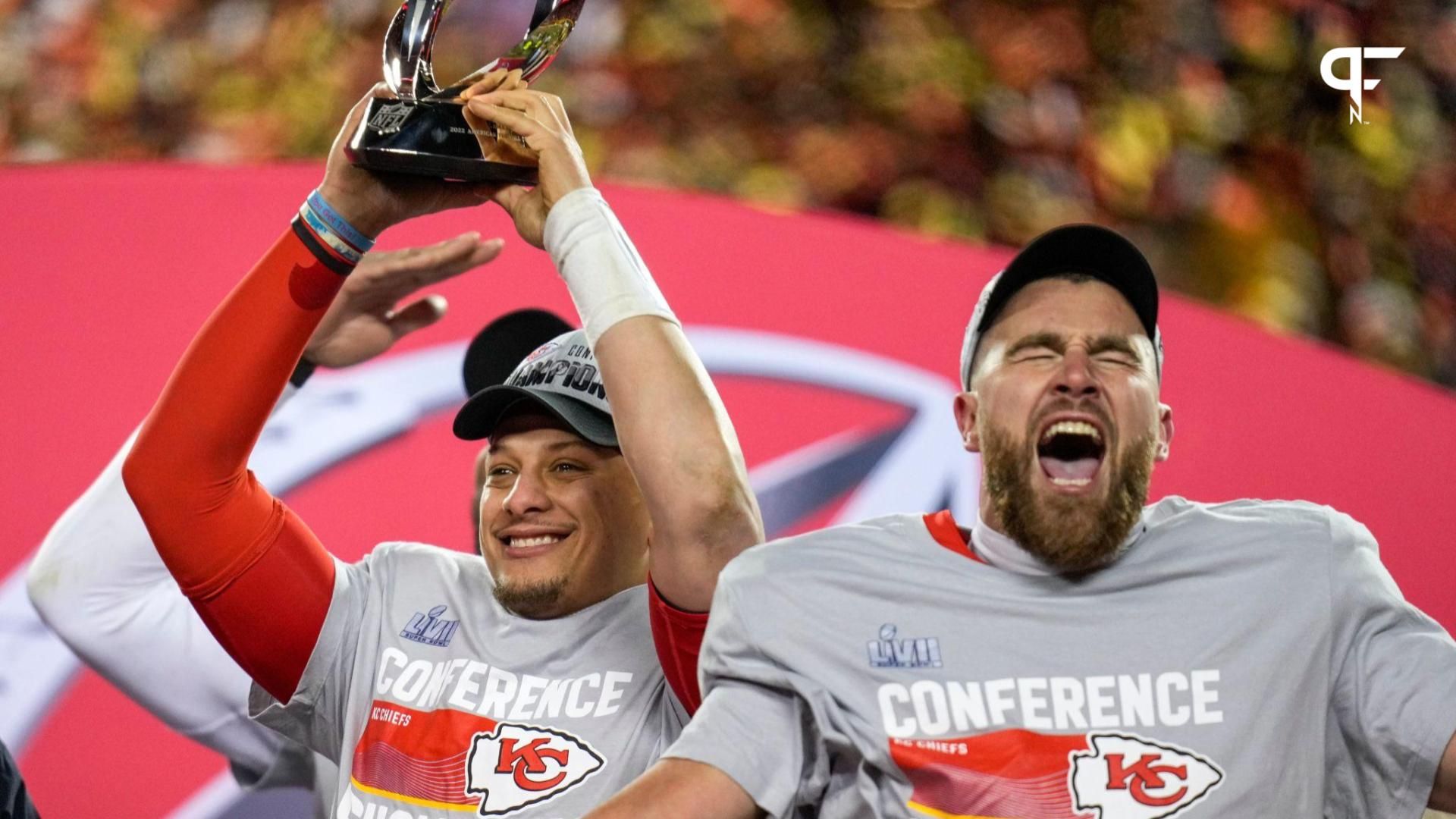 Kansas City Chiefs QB Patrick Mahomes and TE Travis Kelce celebrate with the Lamar Hunt Trophy after winning the AFC Championship Game.