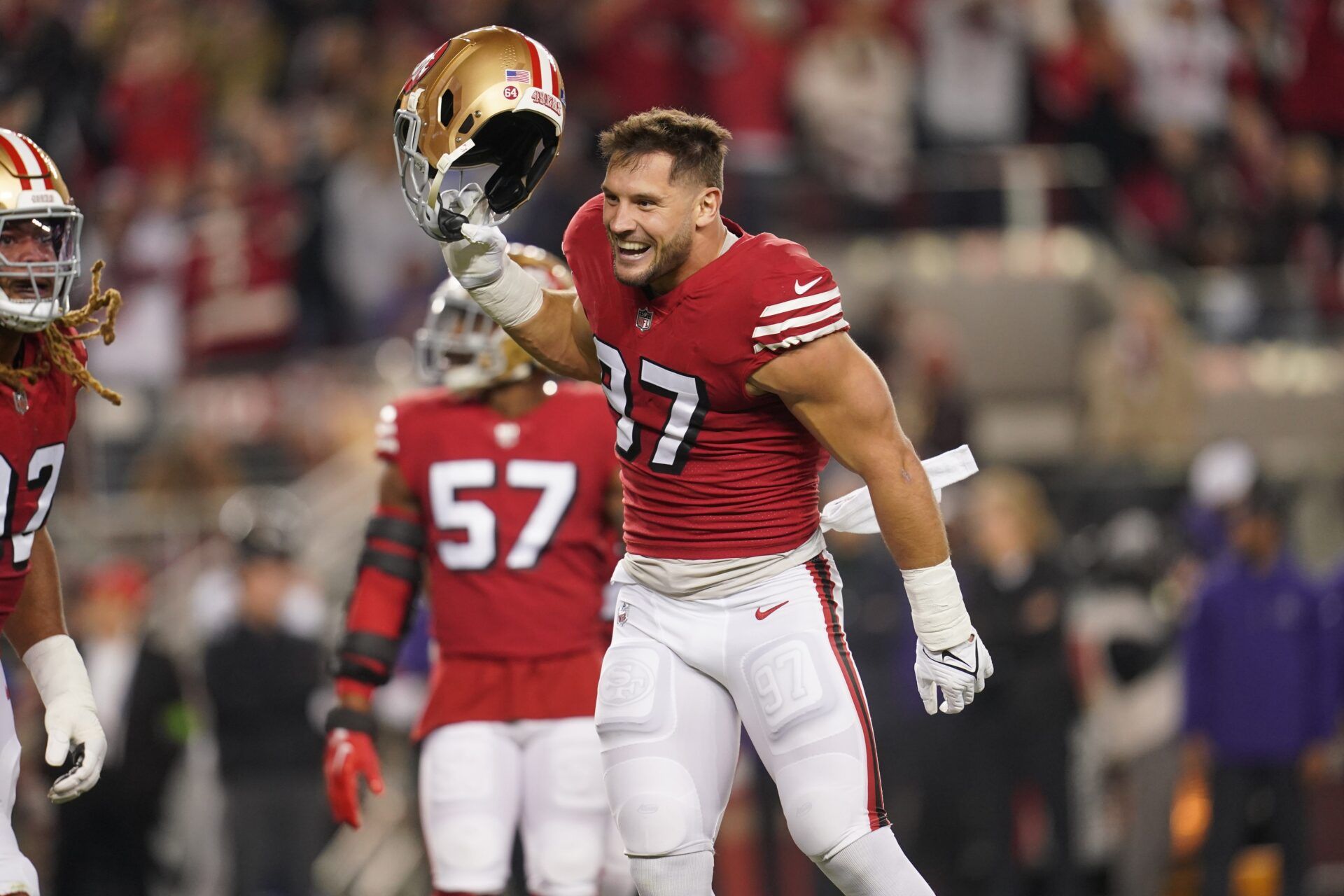 San Francisco 49ers defensive end Nick Bosa (97) reacts after the 49ers recorded a safety against the Baltimore Ravens in the first quarter at Levi's Stadium.