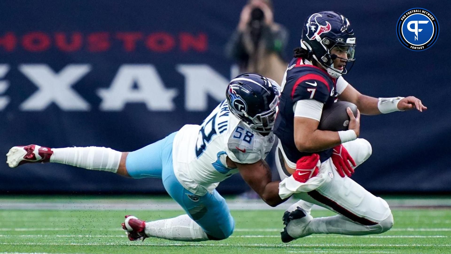 Houston Texans quarterback C.J. Stroud (7) is sacked by Tennessee Titans linebacker Harold Landry III (58) during the fourth quarter at NRG Stadium in Houston, Texas., Sunday, Dec. 31, 2023.