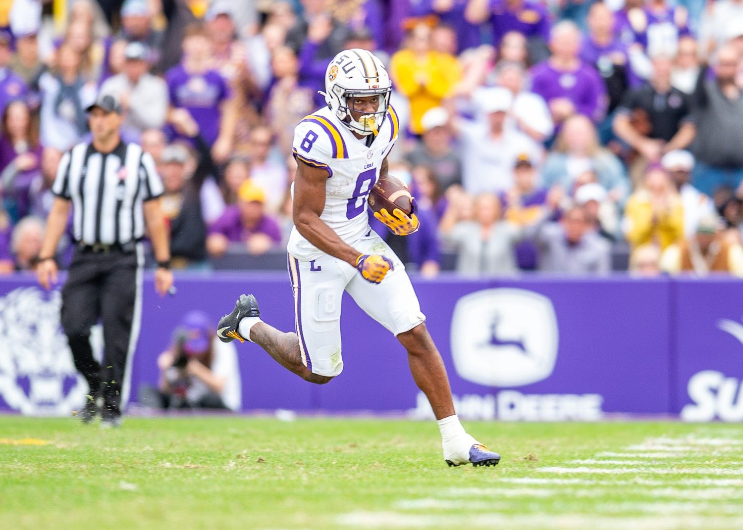 Malik Nabers 8 runs the ball as the LSU Tigers take on Texas A&M in Tiger Stadium in Baton Rouge, Louisiana, November 25, 2023.