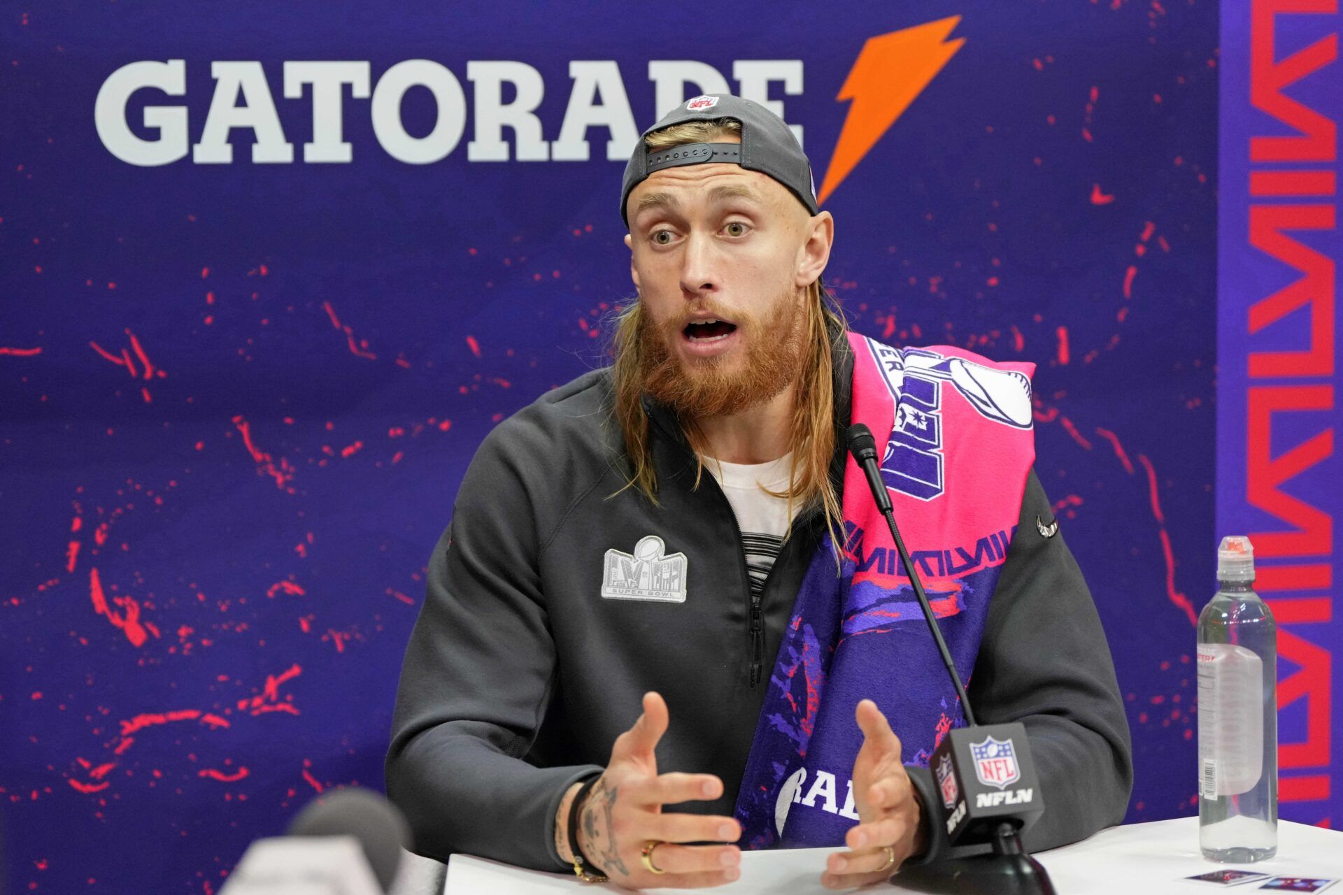 San Francisco 49ers TE George Kittle (85) talks to the media during Super Bowl LVIII Opening Night at Allegiant Stadium.