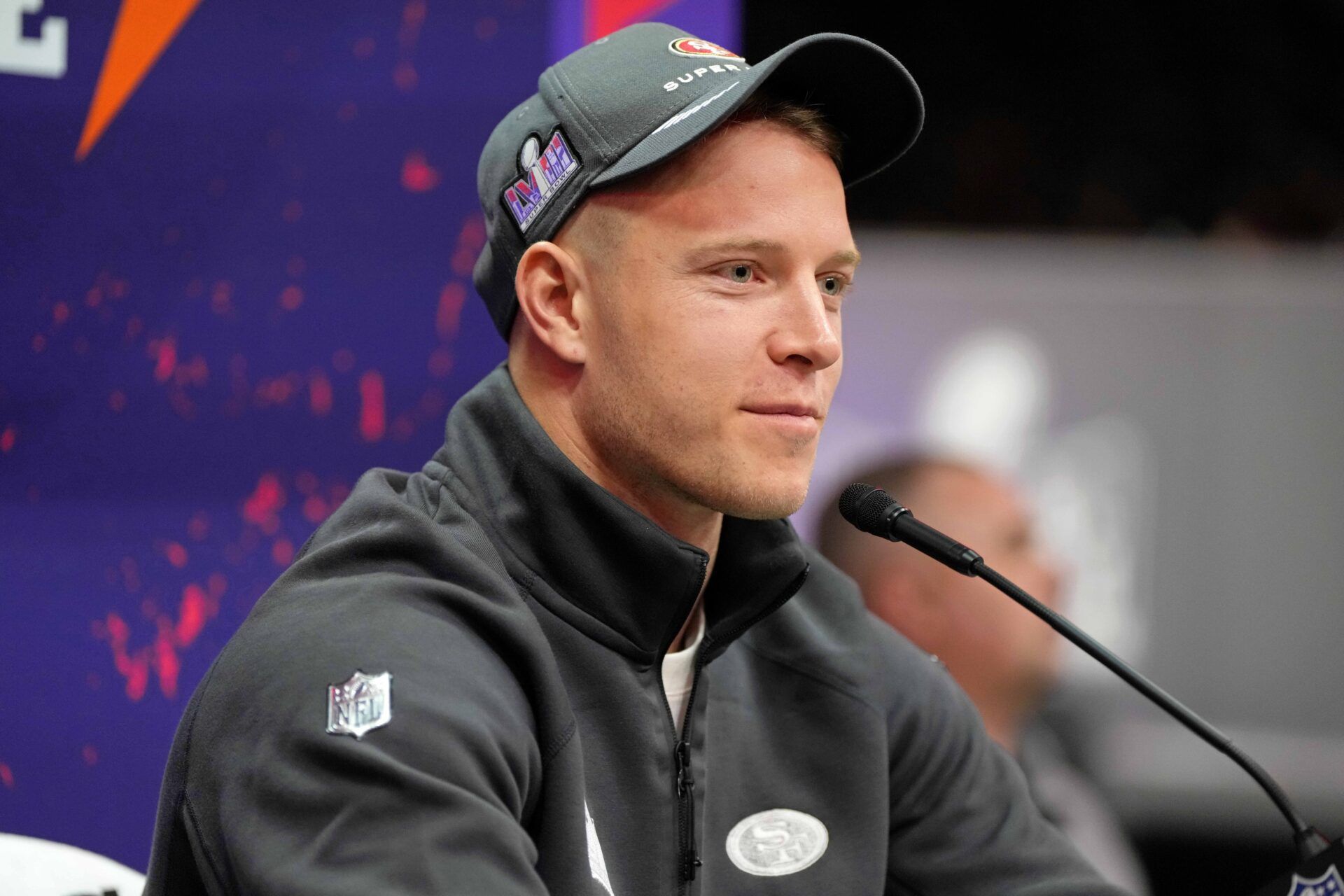 San Francisco 49ers RB Christian McCaffrey talks to the media during Super Bowl LVIII Opening Night at Allegiant Stadium.