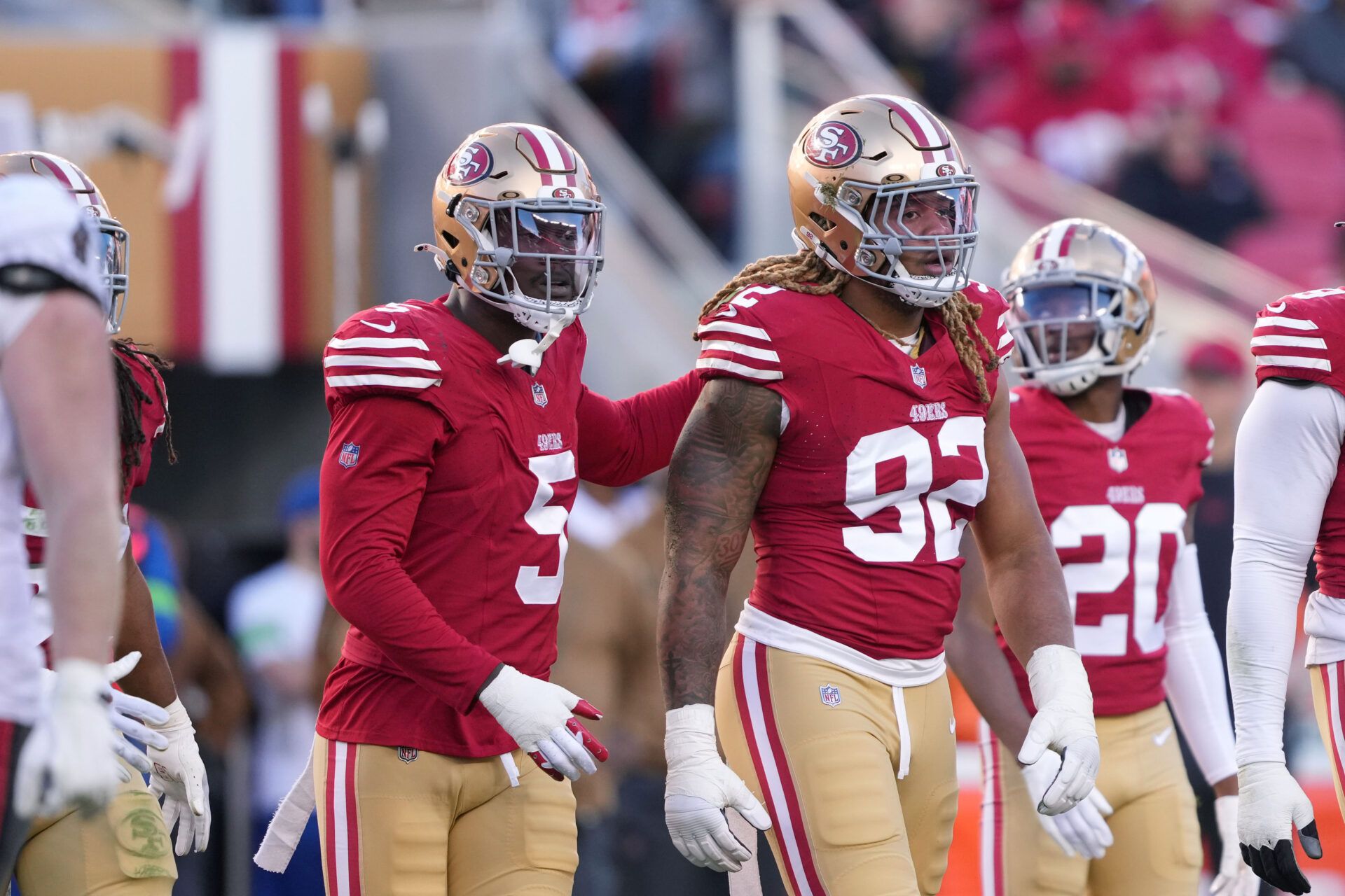 San Francisco 49ers linebacker Randy Gregory (5) and defensive end Chase Young (92) during the third quarter against the Tampa Bay Buccaneers at Levi's Stadium.