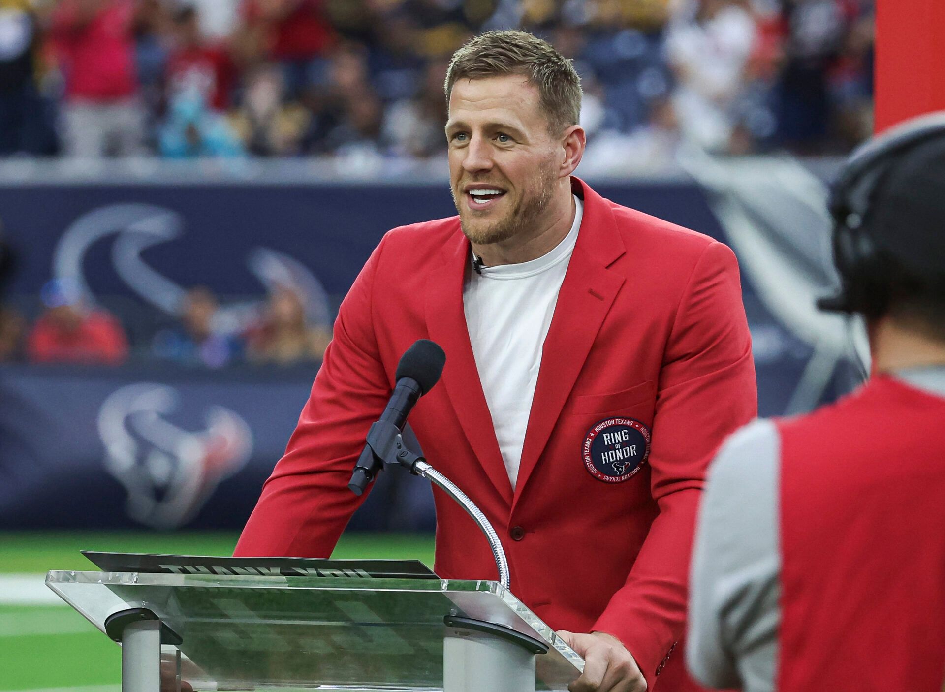 Former Houston Texans player J.J. Watt speaks to the crowd after being inducted into the Texans Ring of Honor during the game against the Pittsburgh Steelers at NRG Stadium.