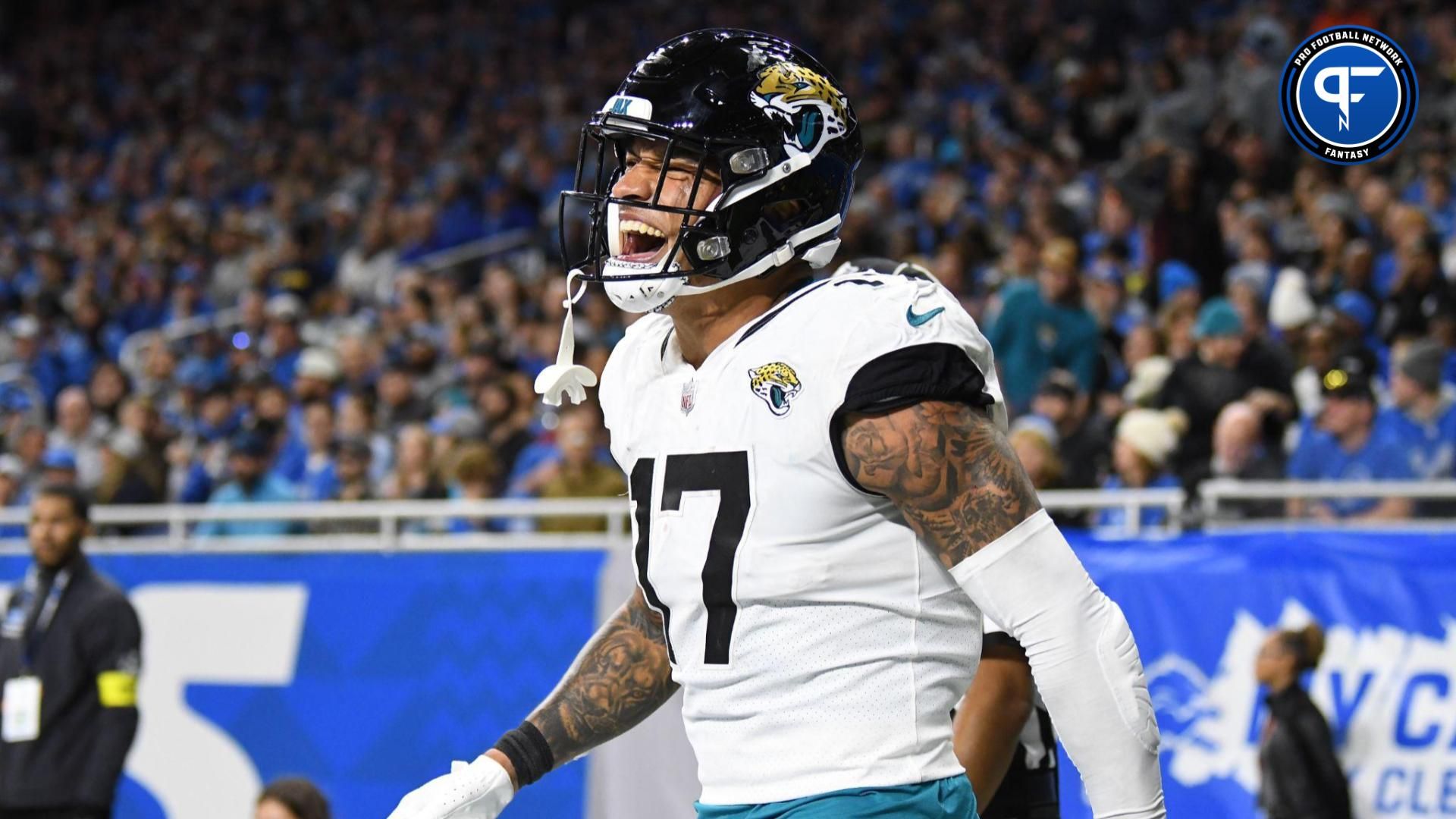 Jacksonville Jaguars tight end Evan Engram (17) celebrates after catching a touchdown pass from quarterback Trevor Lawrence (not pictured) against the Detroit Lions in the third quarter at Ford Field.