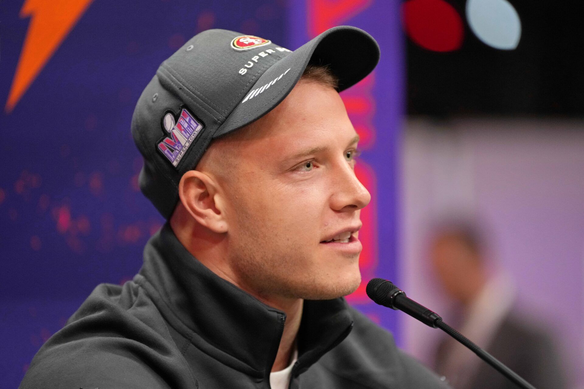 San Francisco 49ers running back Christian McCaffrey (23) talks to the media during Super Bowl LVIII Opening Night at Allegiant Stadium.