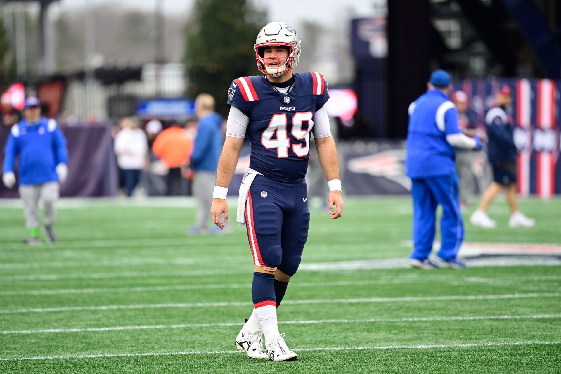 New England Patriots long snapper Joe Cardona (49) warms up before a game against the Kansas City Chiefs at Gillette Stadium.