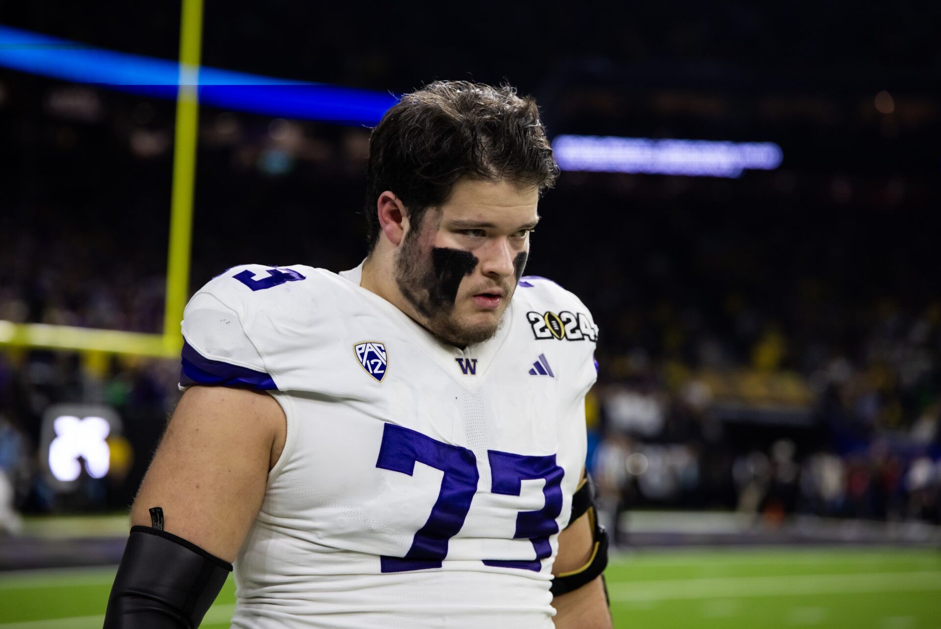 Washington Huskies offensive lineman Roger Rosengarten (73) against the Michigan Wolverines during the 2024 College Football Playoff national championship game at NRG Stadium.