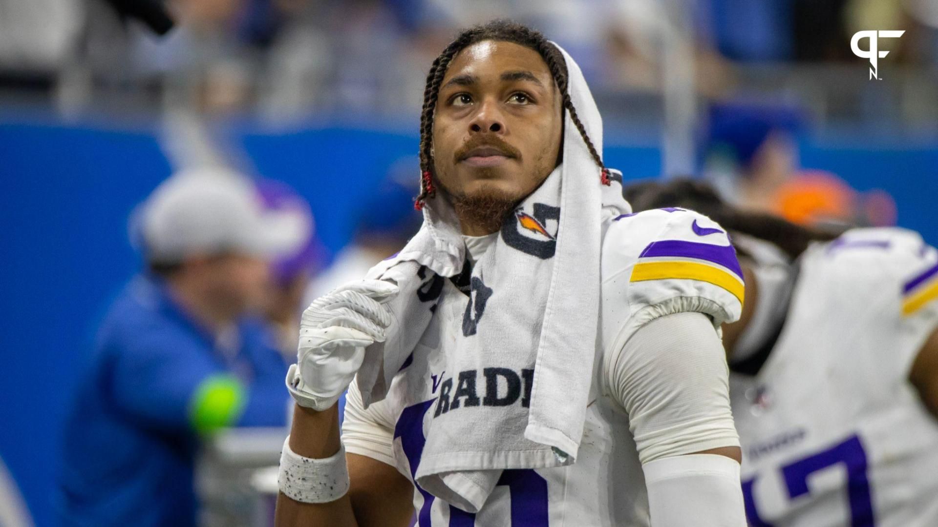 Minnesota Vikings wide receiver Justin Jefferson (18) looks at the big screen during second half of the game against the Detroit Lions at Ford Field.