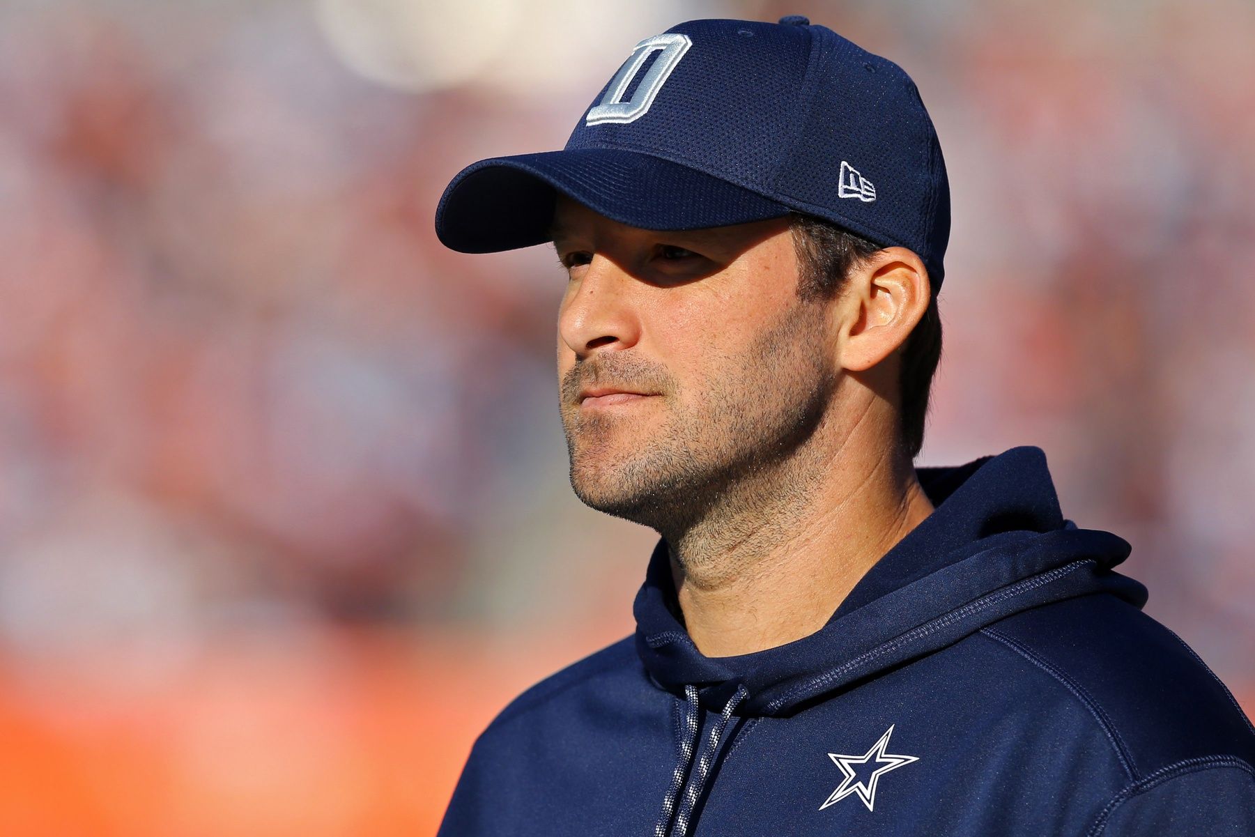 Dallas Cowboys quarterback Tony Romo (9) looks on from the sidelines.