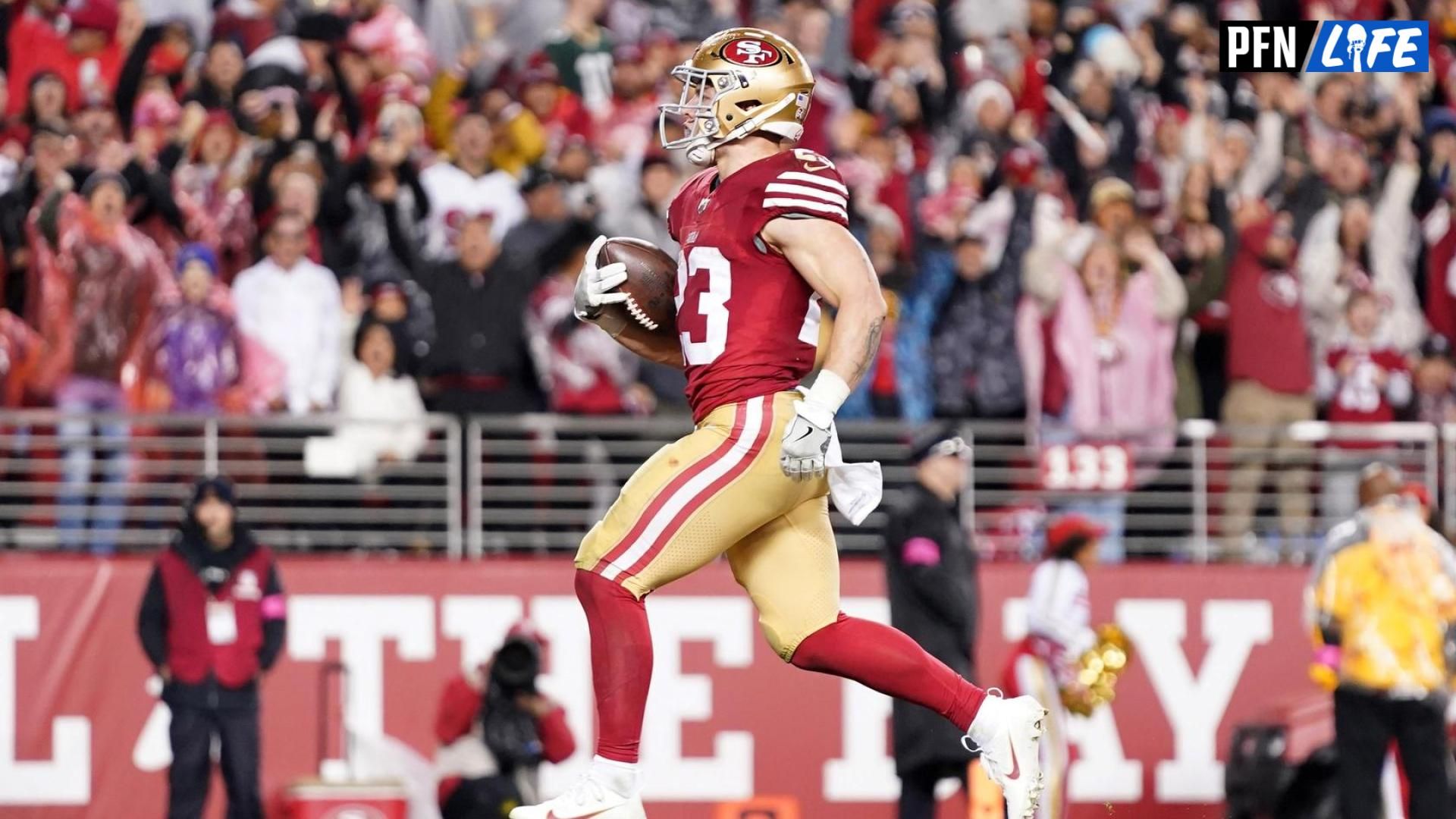 San Francisco 49ers RB Christian McCaffrey (23) runs in for a touchdown against the Green Bay Packers.