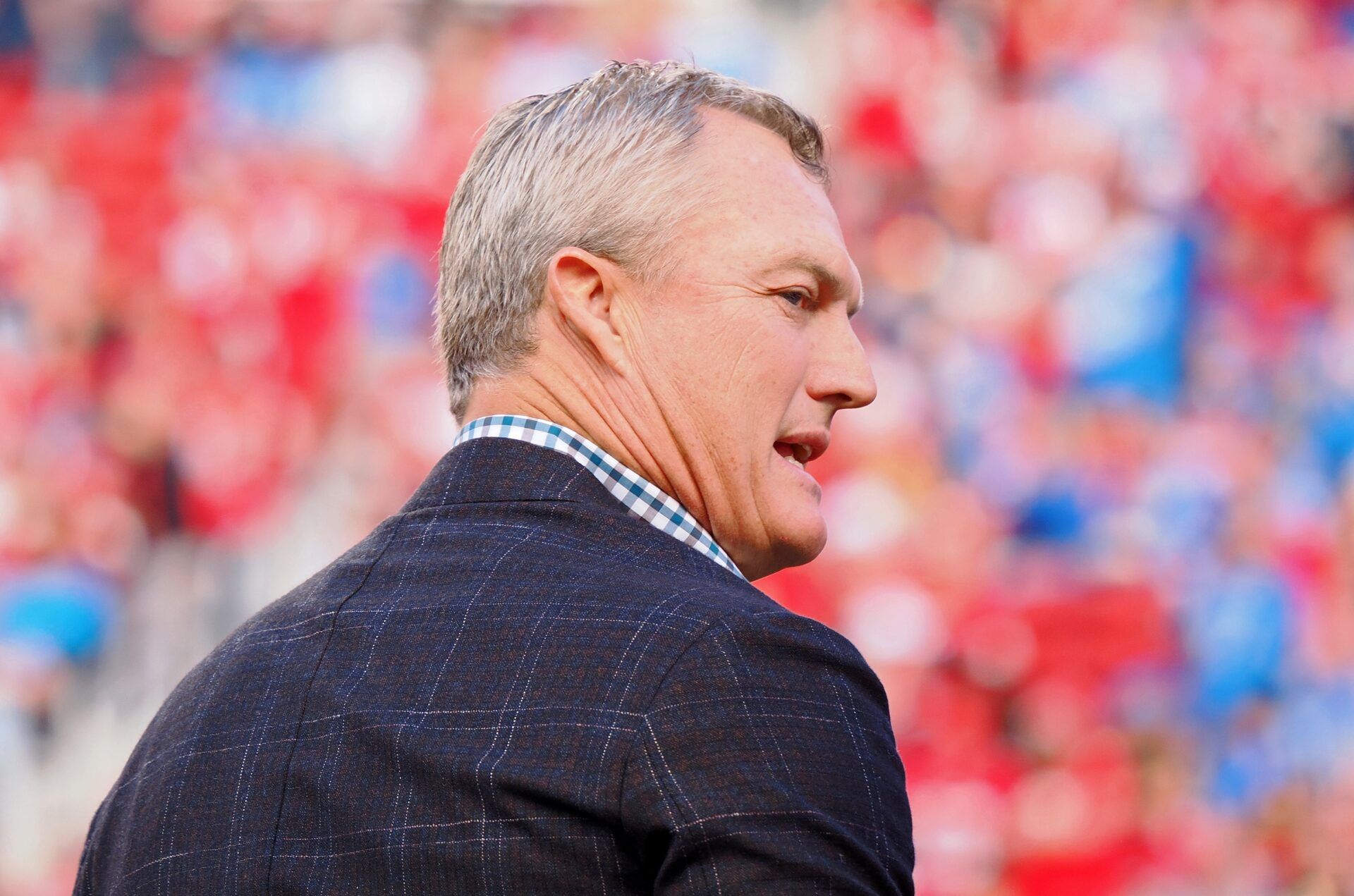 San Francisco 49ers general manager John Lynch looks on before the NFC Championship football game against the Detroit Lions at Levi's Stadium.