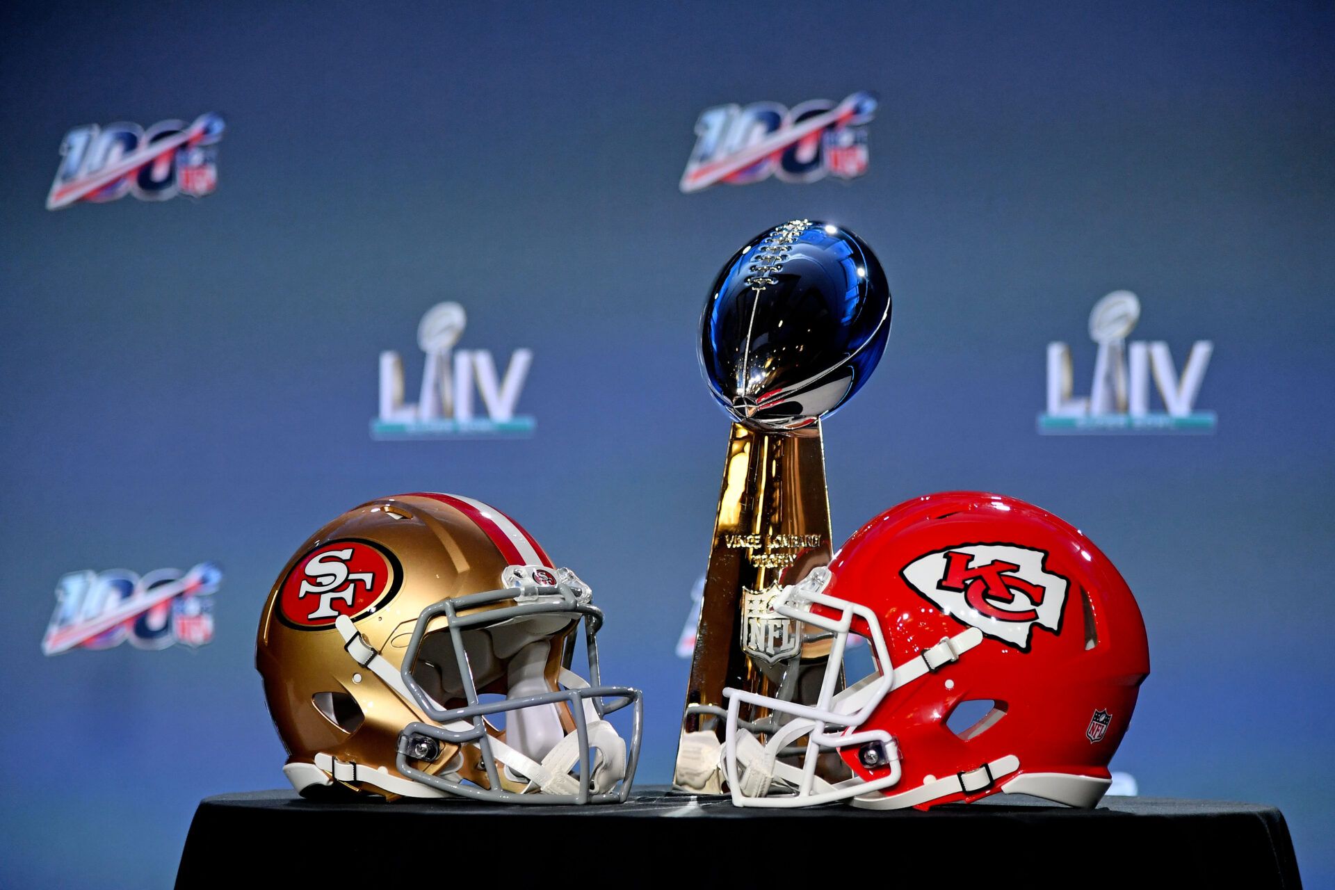 A general view of the helmets of the San Francisco 49ers and Kansas City Chiefs and the Vince Lombardi Trophy on display prior to NFL commissioner Roger Goodell speaking with he media in Miami Florida at the Hilton Downtown.