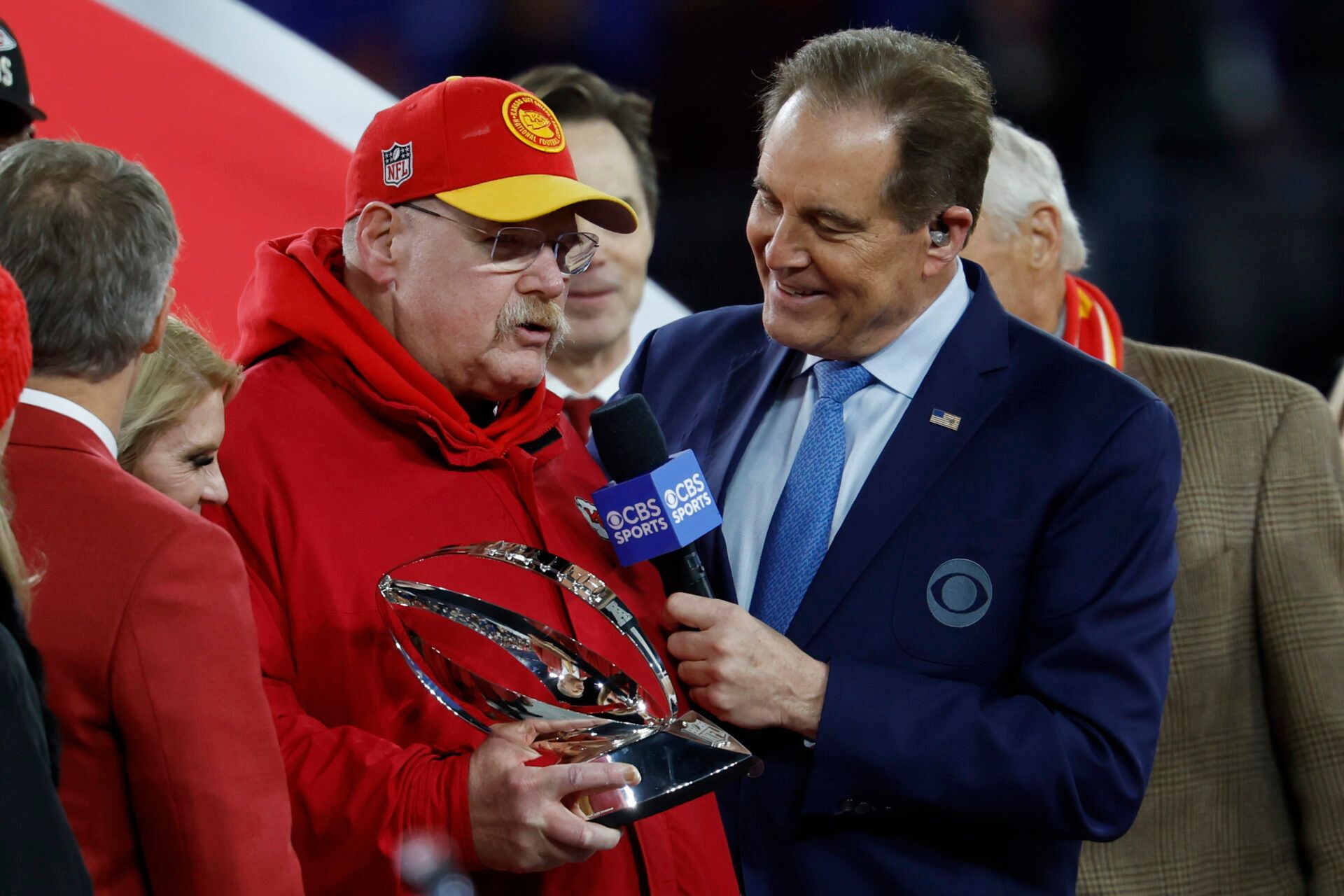 Kansas City Chiefs head coach Andy Ried (L) talks with CBS broadcaster Jim Nantz (R) during the trophy presentation after the Chiefs' game against the Baltimore Ravens in the AFC Championship football game at M&T Bank Stadium.