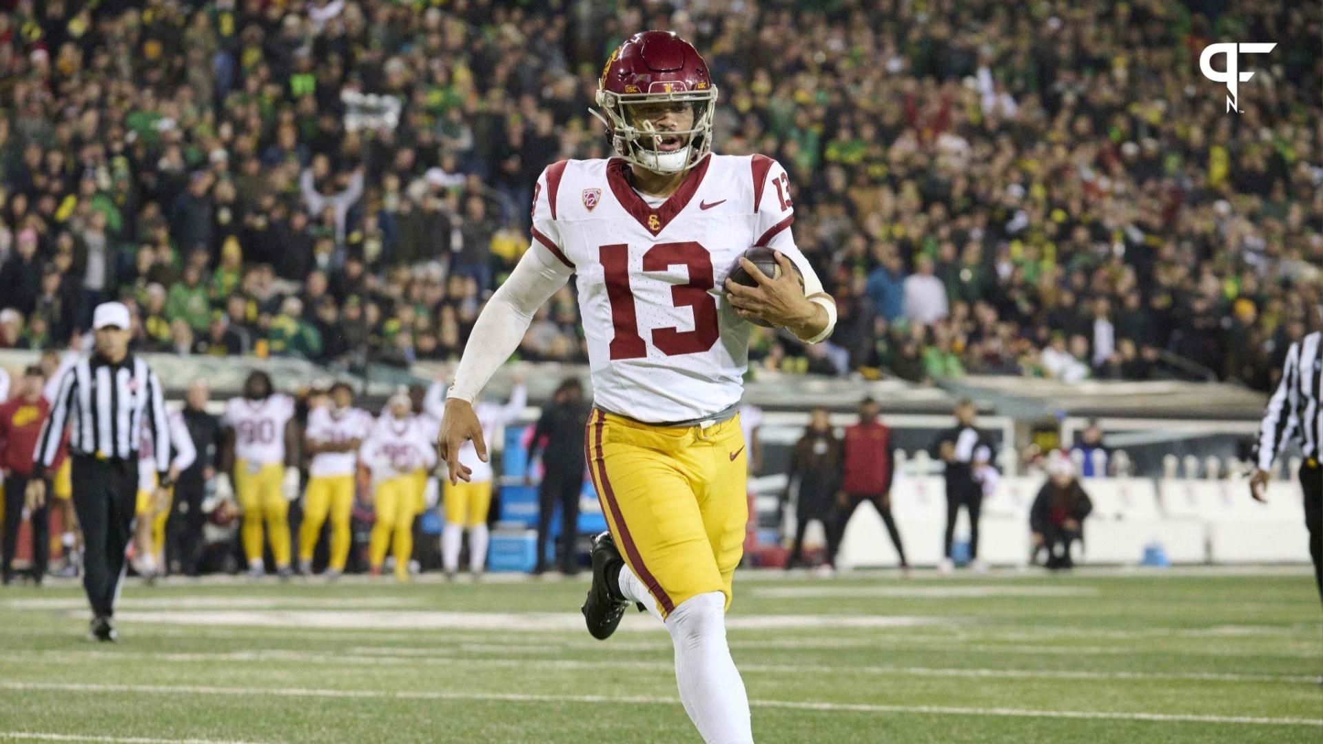 USC Trojans quarterback Caleb Williams (13) scores a touchdown during the first half against the Oregon Ducks at Autzen Stadium.