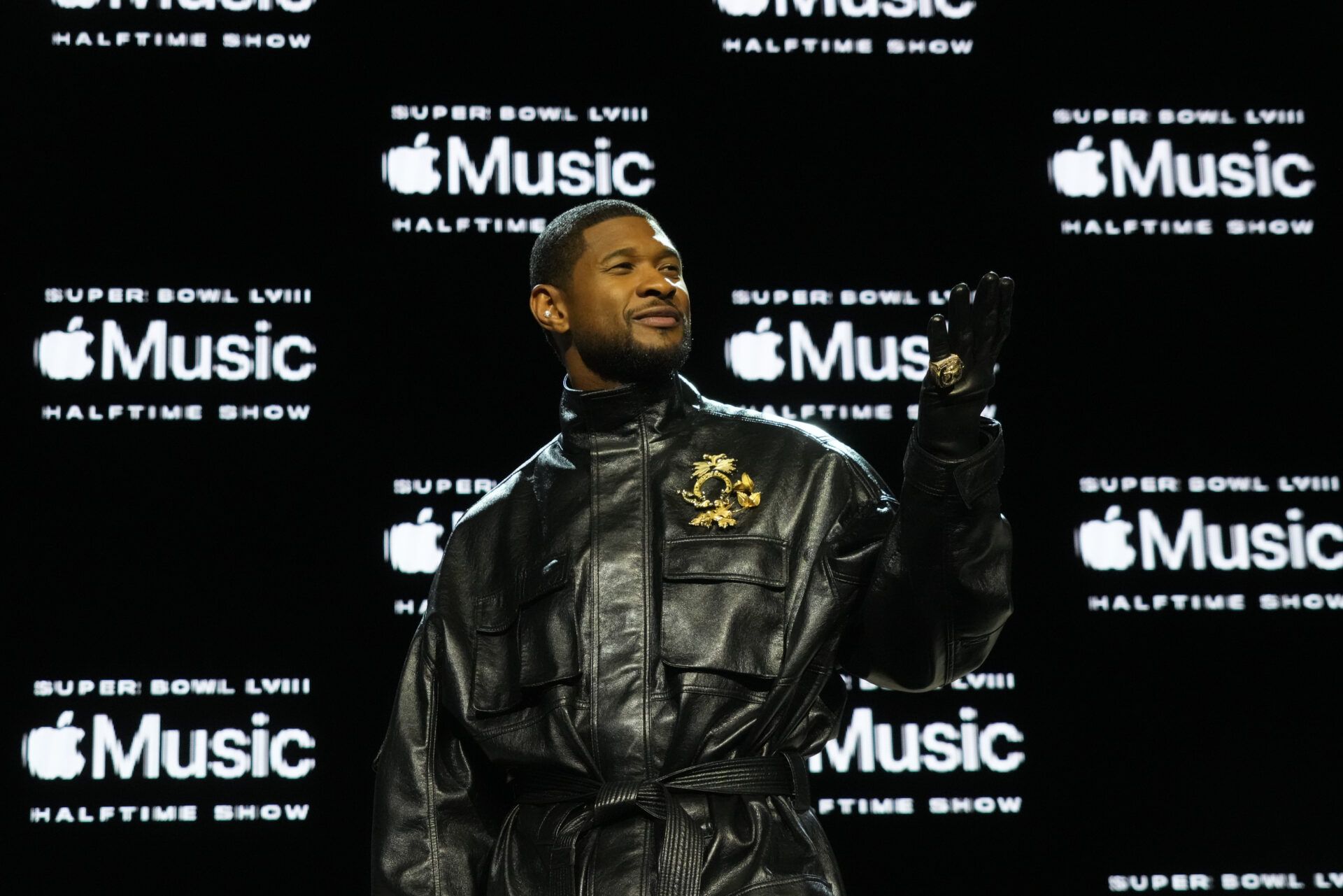 Recording artist Usher poses for photos during the Super Bowl LVIII pregame and halftime show press conference at the Mandalay Bay Convention Center.