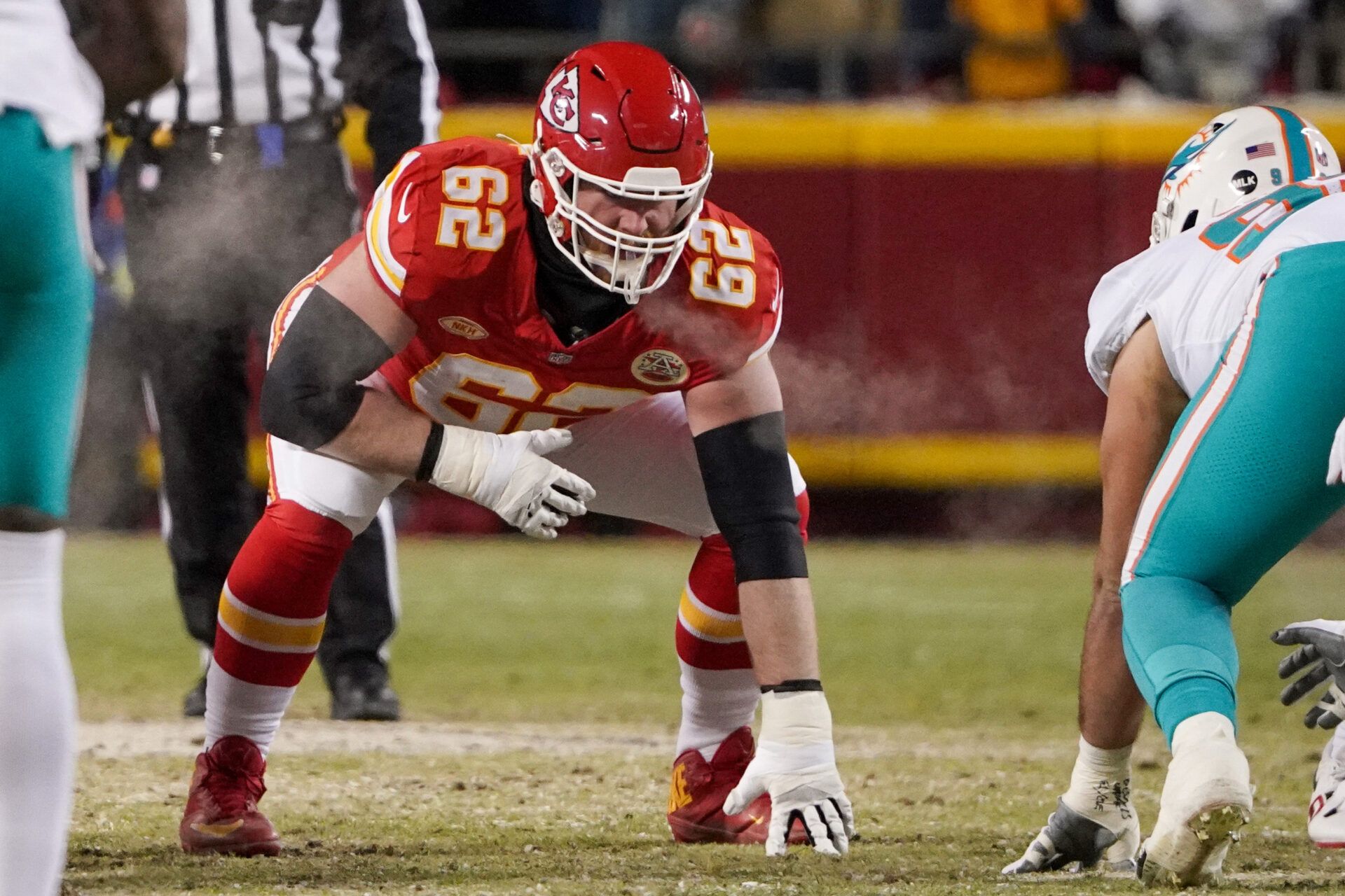 Kansas City Chiefs guard Joe Thuney (62) on the line of scrimmage against the Miami Dolphins in a 2024 AFC wild card game at GEHA Field at Arrowhead Stadium.