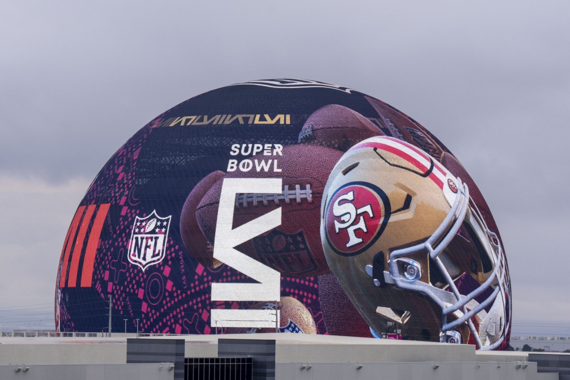 San Francisco 49ers football helmet is displayed on Super Bowl LVIII signage on The Sphere.