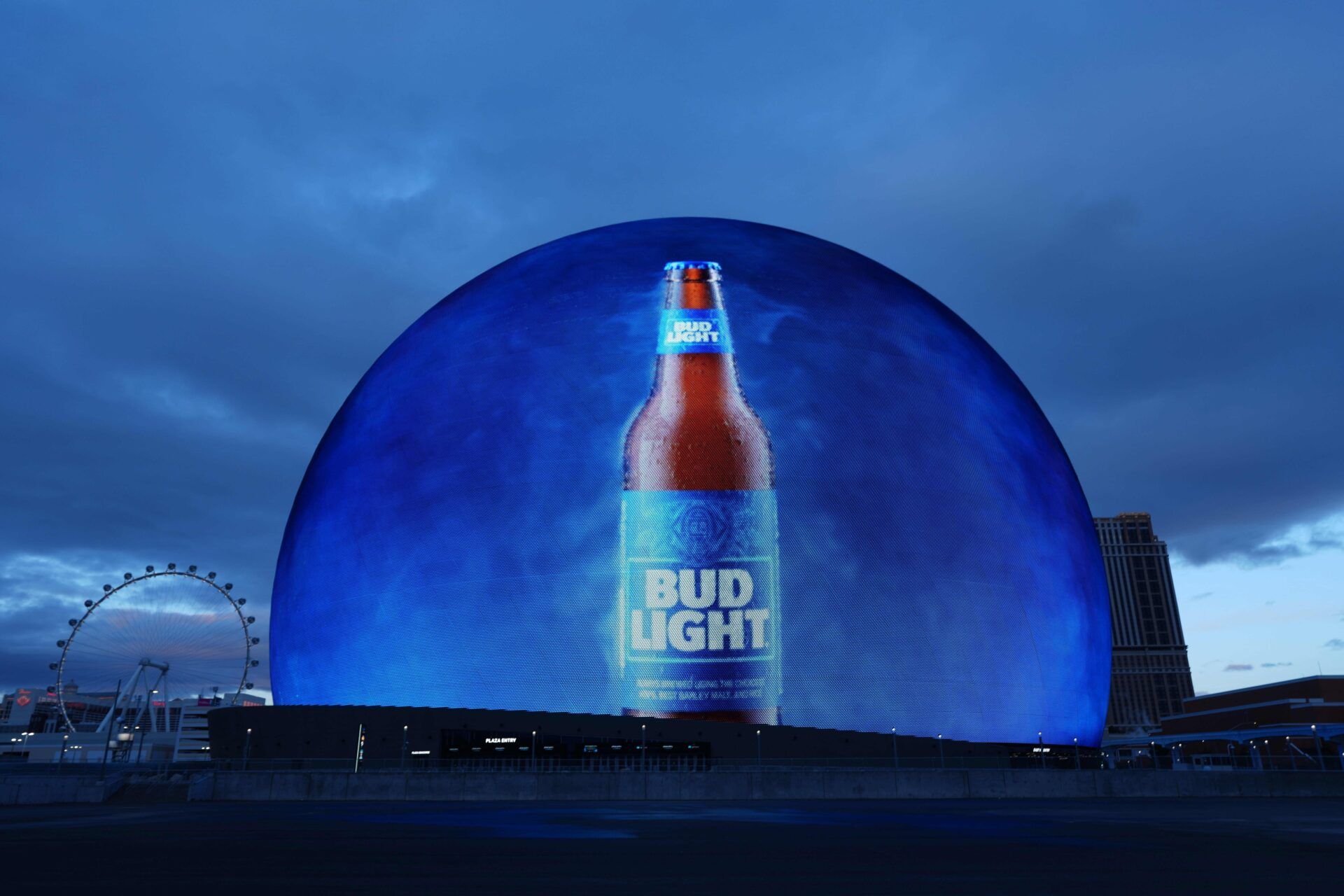 A Bud Light beer advertisement is projected onto the Sphere.