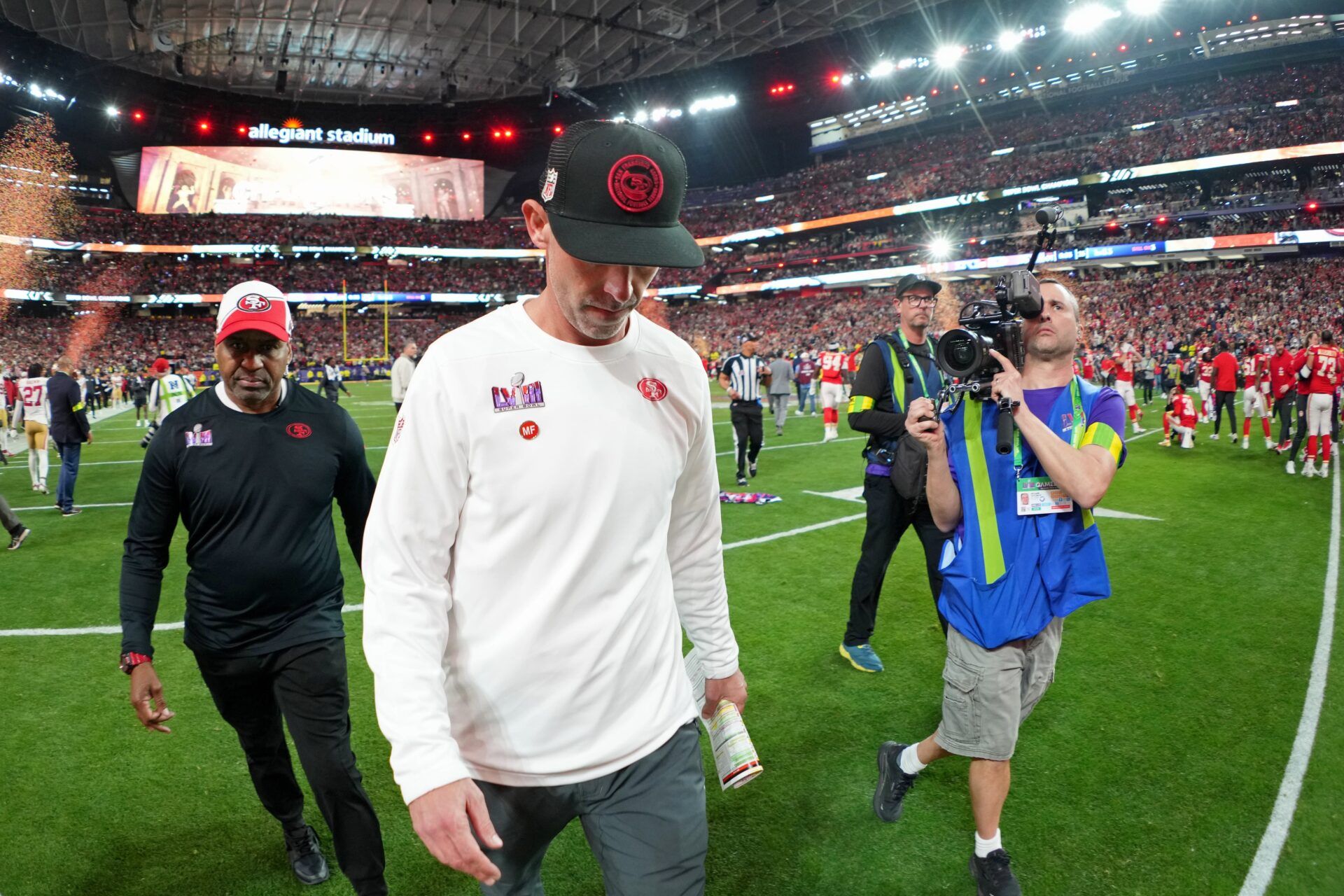 San Francisco 49ers head coach Kyle Shanahan walks off the field after losing Super Bowl LVIII to the Kansas City Chiefs at Allegiant Stadium.