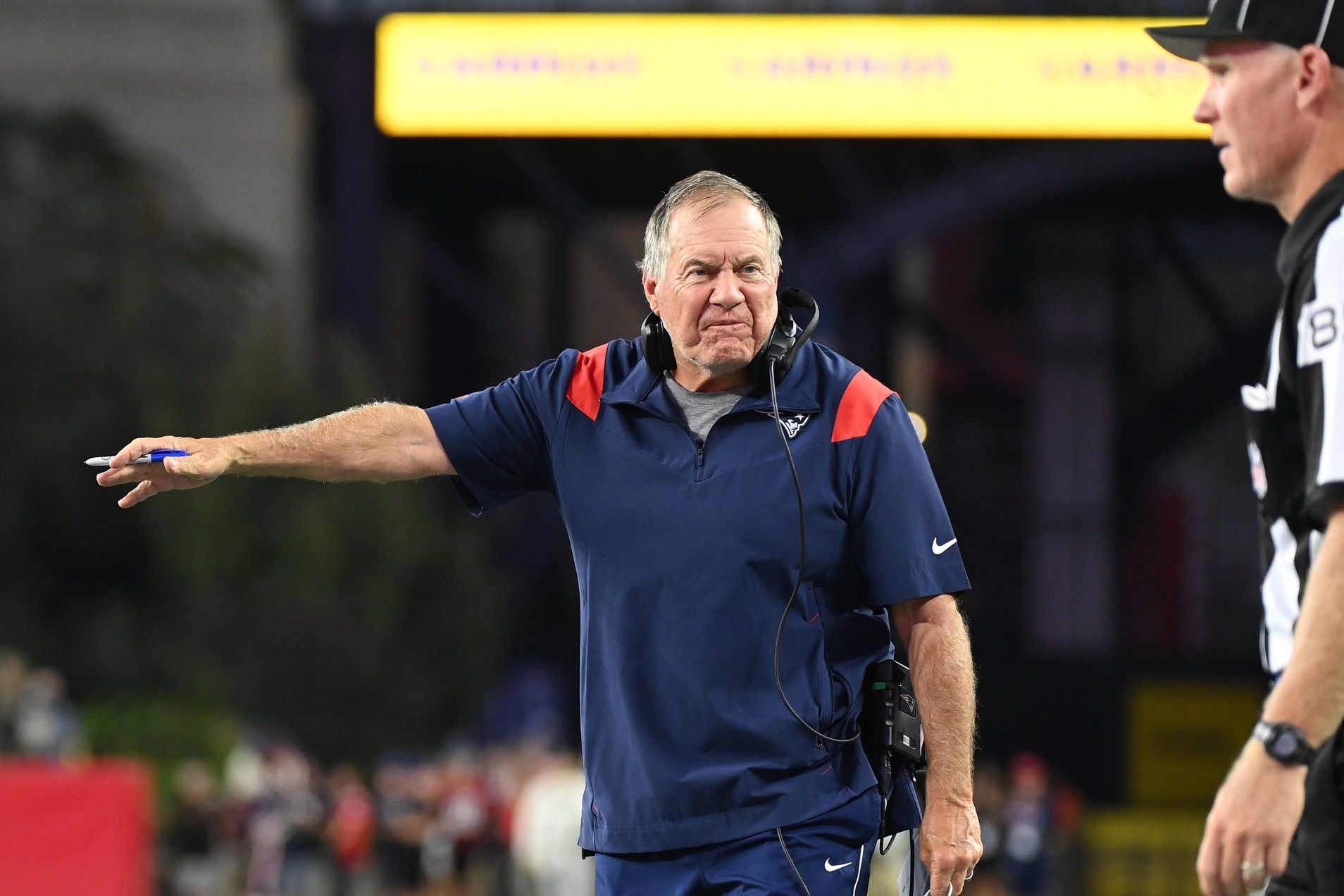 New England Patriots head coach Bill Belichick reacts to a call during the first half of a preseason game against the Carolina Panthers at Gillette Stadium.