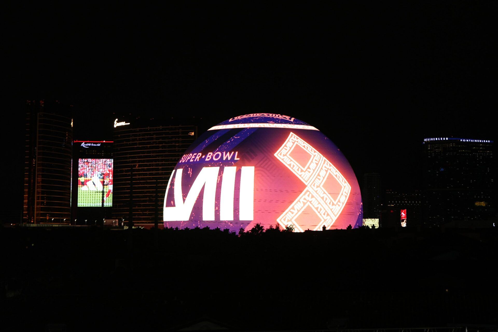 The Super Bowl 58 logo is projected on the Sphere.