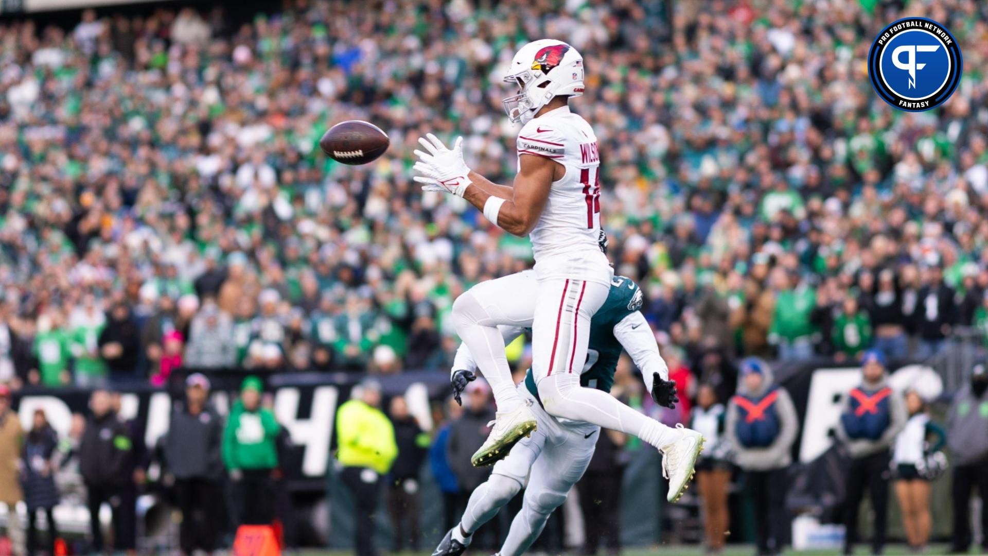 Arizona Cardinals wide receiver Michael Wilson (14) catches a touchdown past Philadelphia Eagles cornerback Kelee Ringo (22) at Lincoln Financial Field.