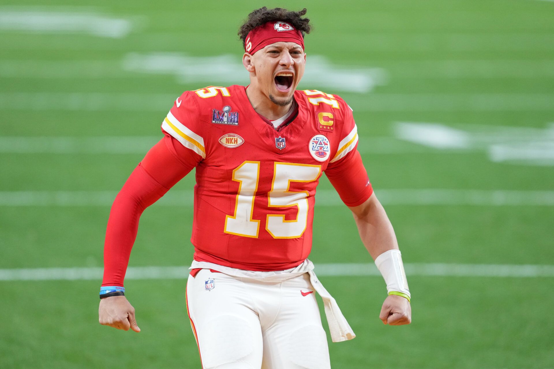 Kansas City Chiefs quarterback Patrick Mahomes (15) shouts during warmups before Super Bowl LVIII against the San Francisco 49ers at Allegiant Stadium.