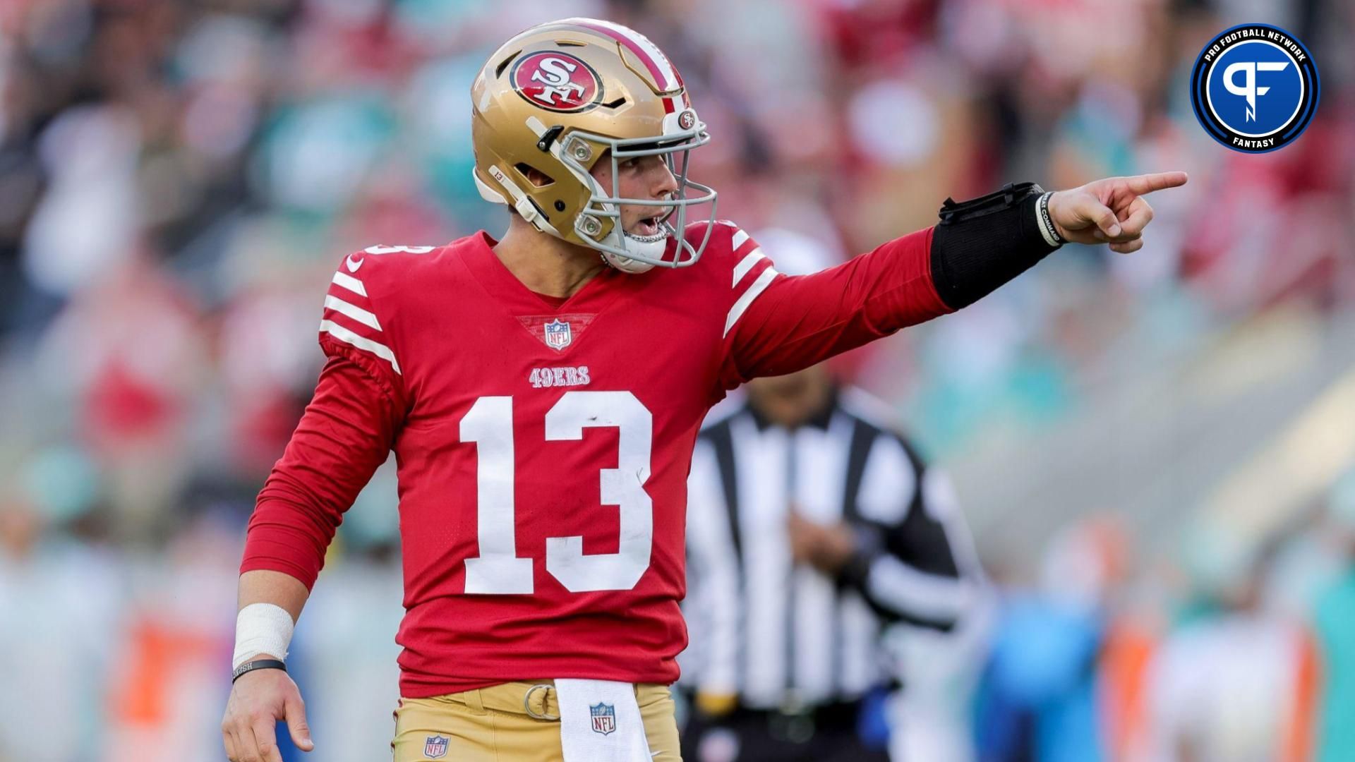 San Francisco 49ers quarterback Brock Purdy (13) celebrates after throwing a touchdown pass during the second quarter against the Miami Dolphins at Levi's Stadium.