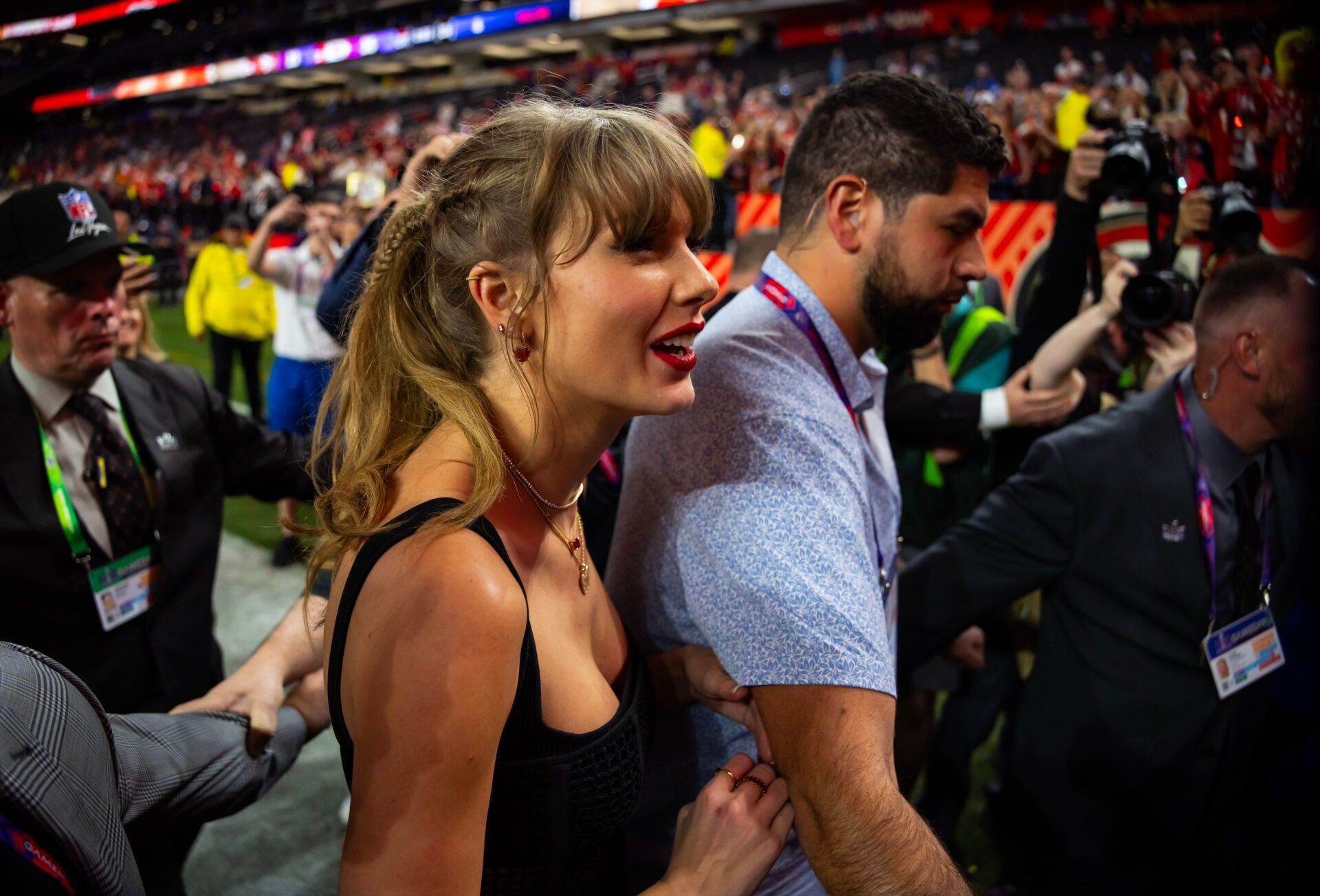 Taylor Swift on the field after the Kansas City Chiefs defeated the San Francisco 49ers in Super Bowl LVIII at Allegiant Stadium.