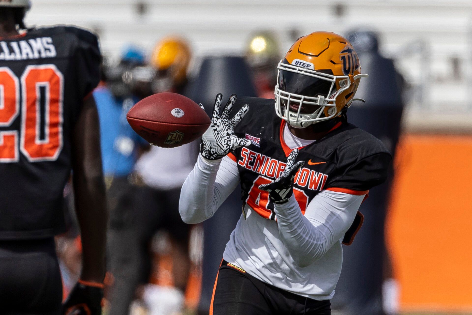 American linebacker Tyrice Knight of UTEP (40) grabs an interception in drills during practice for the American team at Hancock Whitney Stadium.