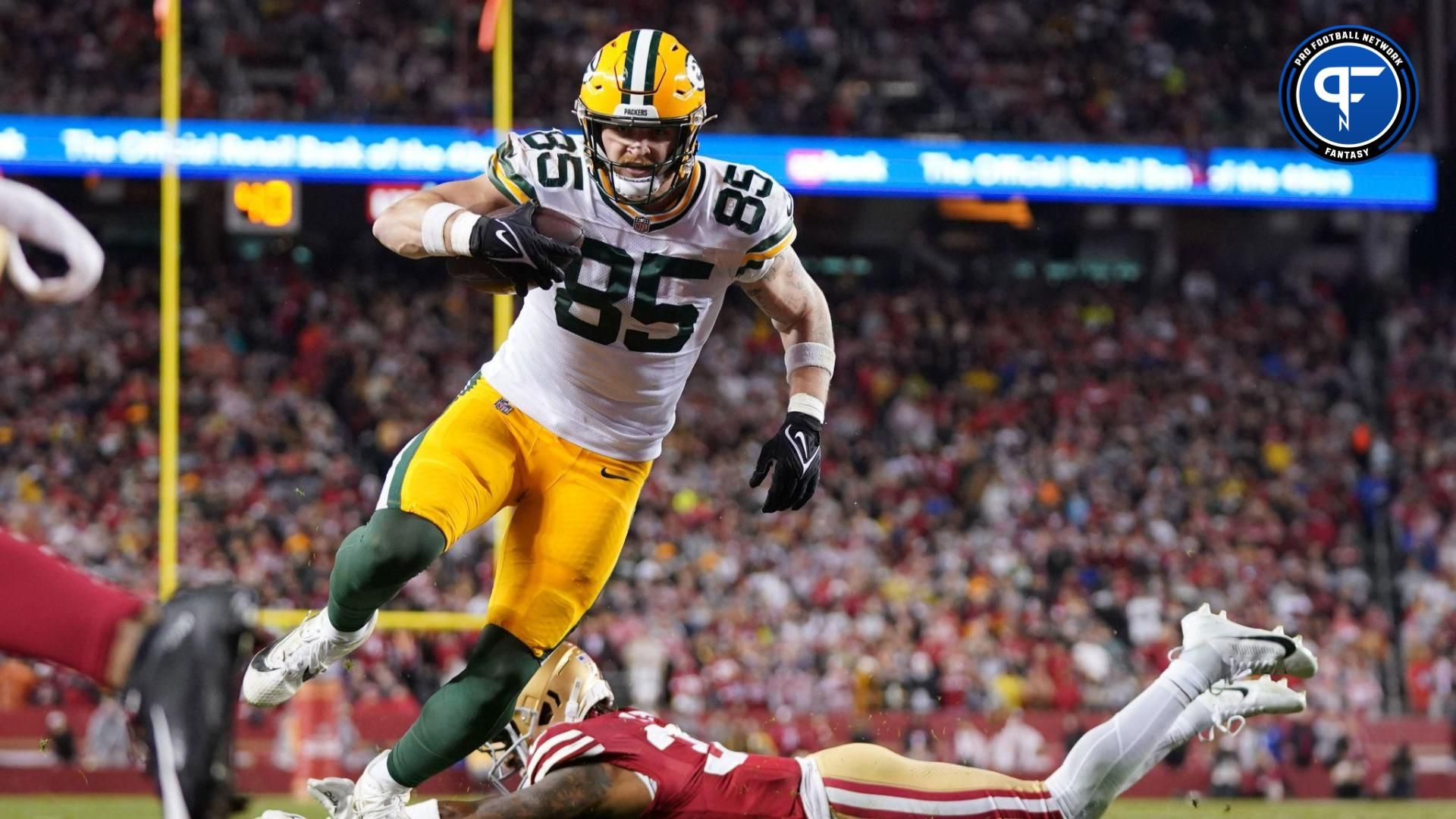 January 20, 2024; Santa Clara, CA, USA; Green Bay Packers tight end Tucker Kraft (85) scores a touchdown against the San Francisco 49ers during the third quarter in a 2024 NFC divisional round game at Levi's Stadium.