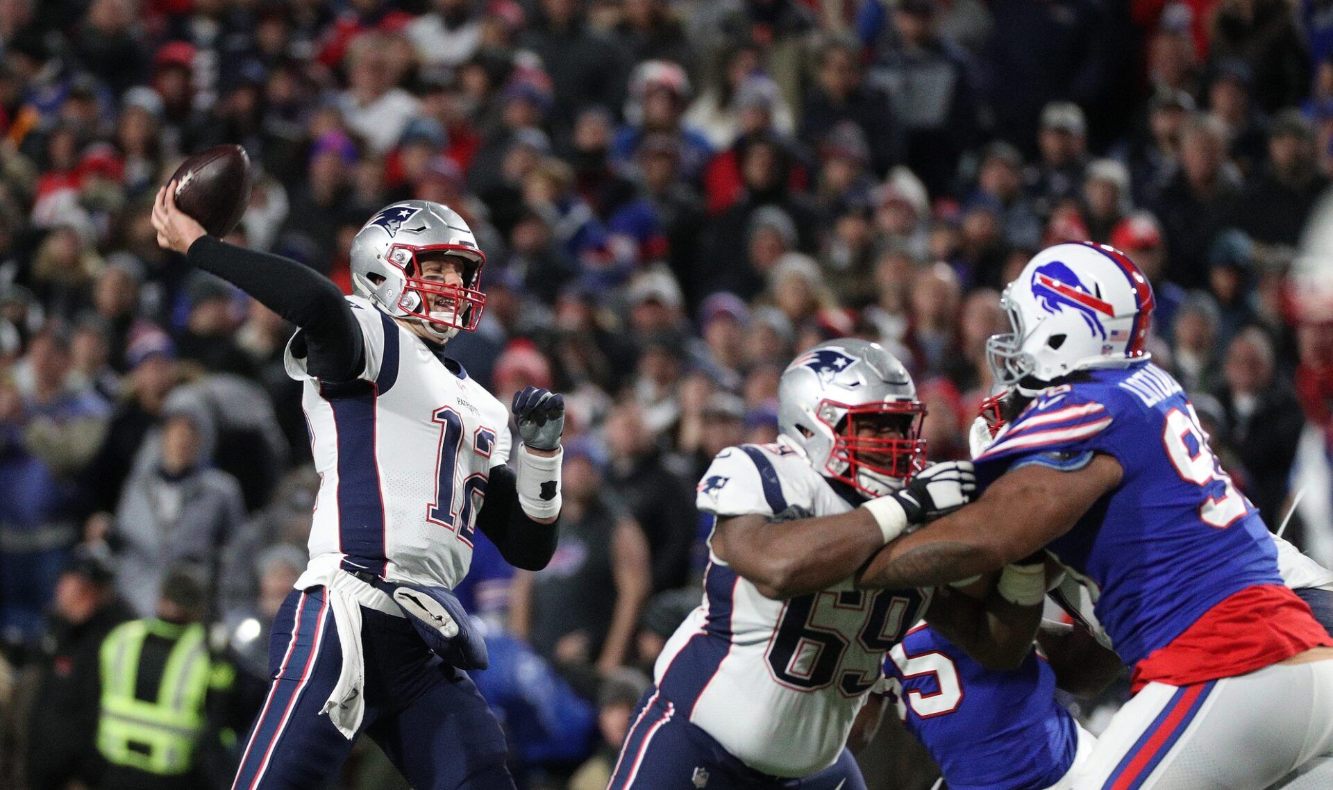 Patriots quarterback Tom Brady steps into a throw against the Bills.