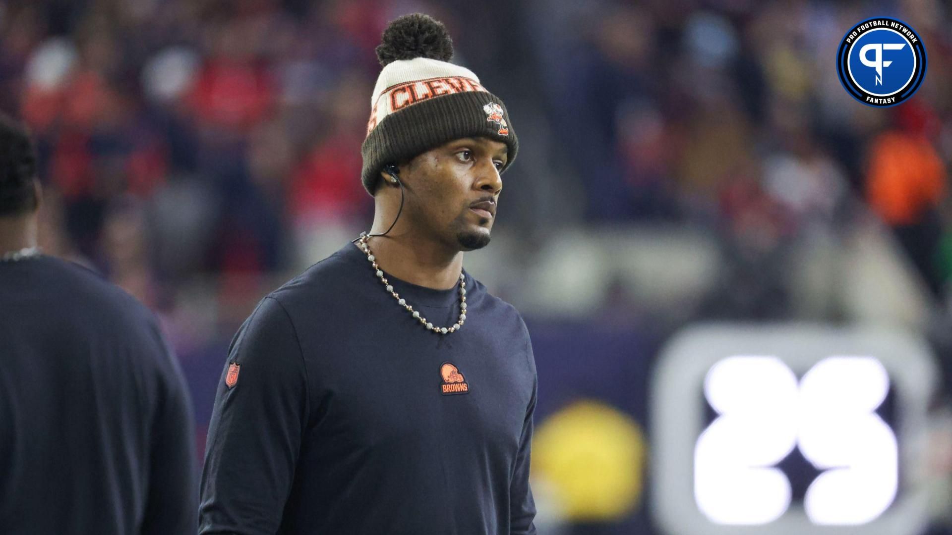 Cleveland Browns quarterback Deshaun Watson looks on from the sideline in a 2024 AFC wild card game against the Houston Texans at NRG Stadium.