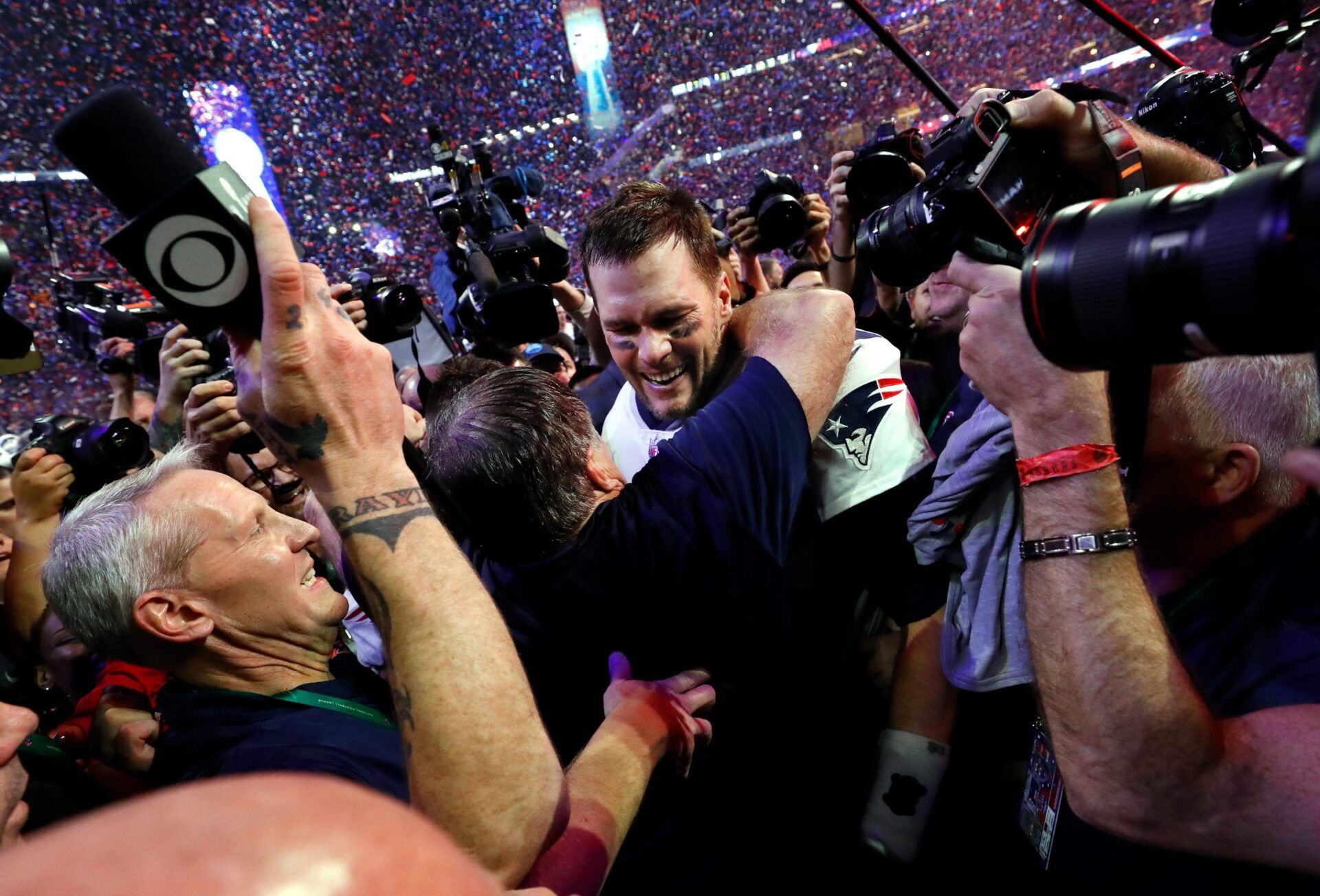 Tom Brady celebrates with coach Bill Belichick after winning 13-3 over the Los Angeles Rams in Super Bowl LIII at the Mercedes-Benz Stadium in Atlanta.