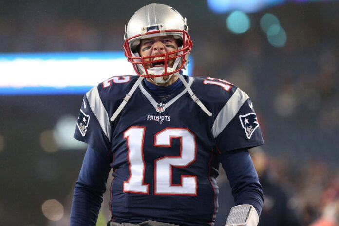 Jan 22, 2017; Foxborough, MA, USA; New England Patriots quarterback Tom Brady (12) yells while running onto the field prior to the Patriots' game against the Pittsburgh Steelers in the 2017 AFC Championship Game at Gillette Stadium. Mandatory Credit: Geoff Burke-USA TODAY Sports