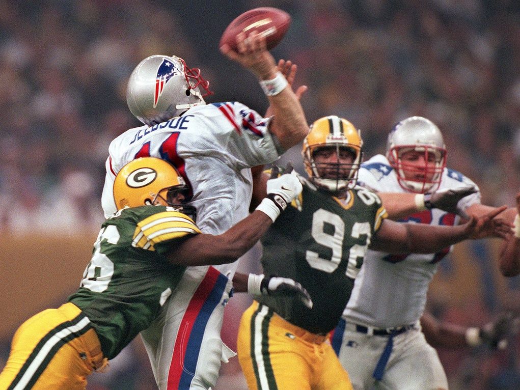 LeRoy Butler hits Patriots quarterback Drew Bledsoe on Monday Oct. 27, 1997 at Foxboro Stadium.