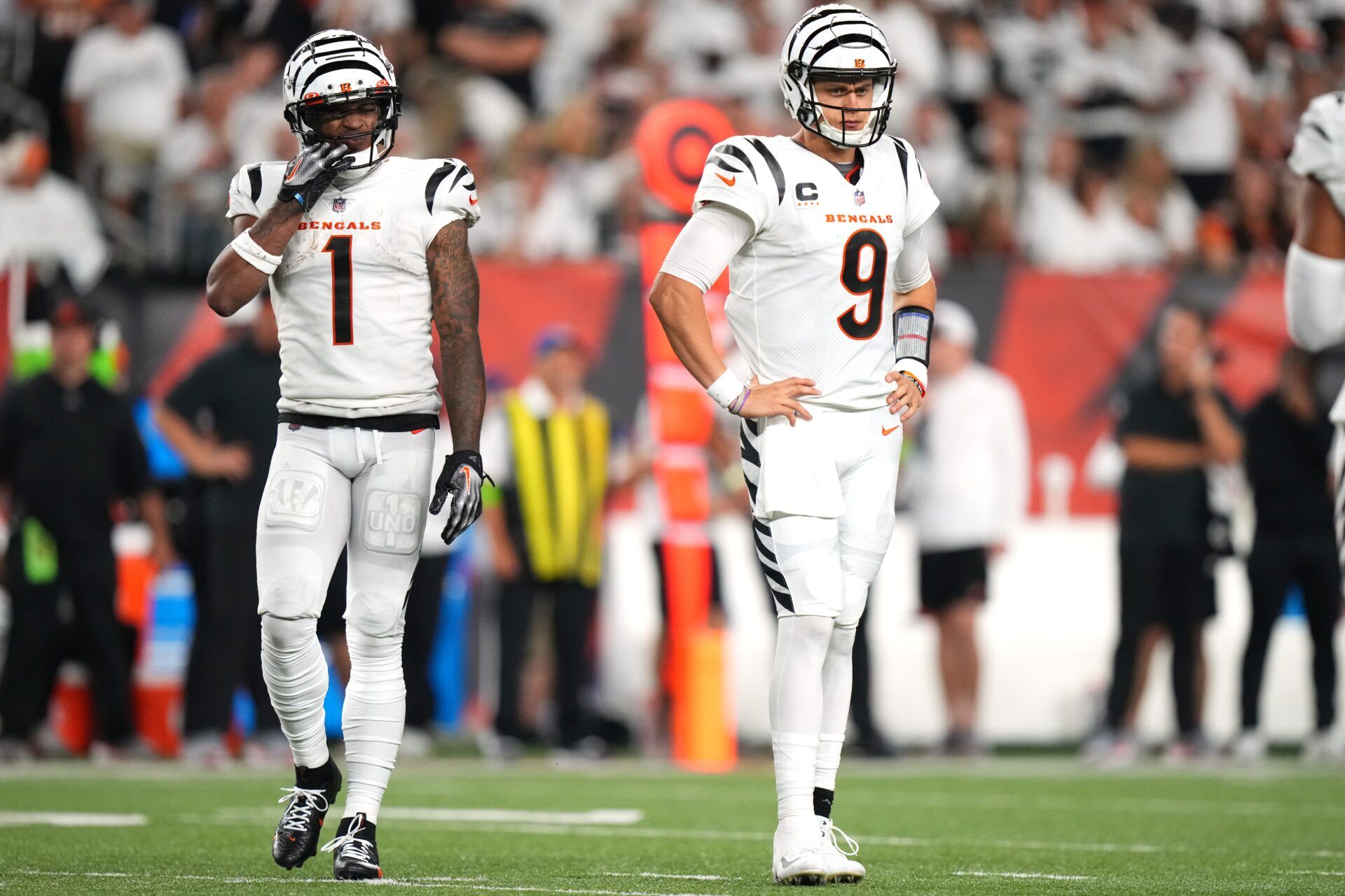 Cincinnati Bengals wide receiver Ja'Marr Chase (1) and Cincinnati Bengals quarterback Joe Burrow (9) get set for a play in the fourth quarter during a Week 3 NFL football game between the Los Angeles Rams and the Cincinnati Bengals, Monday, Sept. 25, 2023, at Paycor Stadium in Cincinnati.