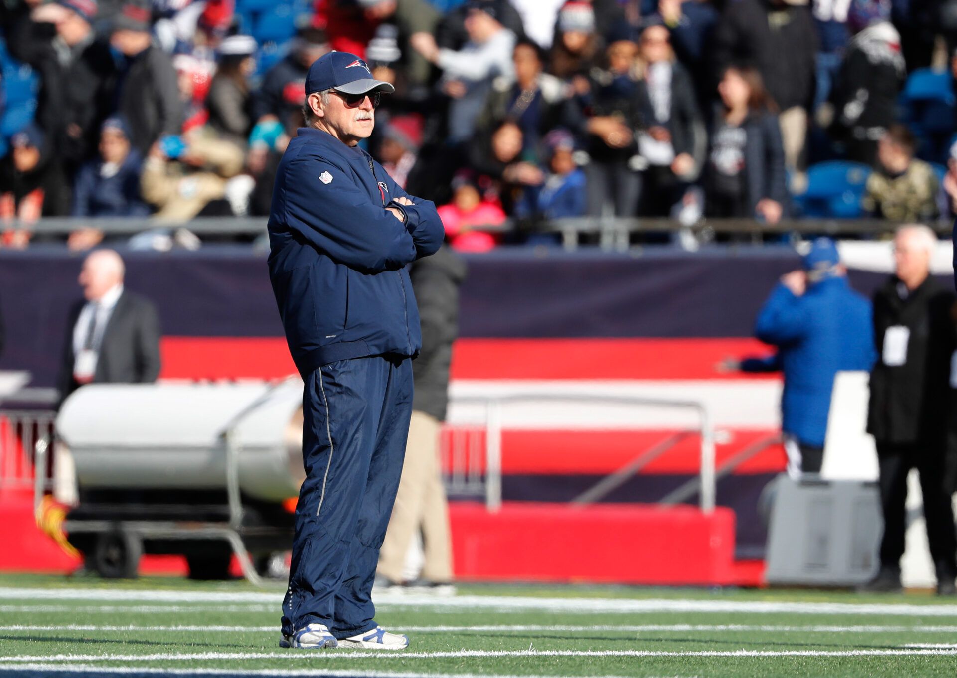 New England Patriots director of football research Ernie Adams watches the Miami Dolphins during warm-ups prior to their game at Gillette Stadium.