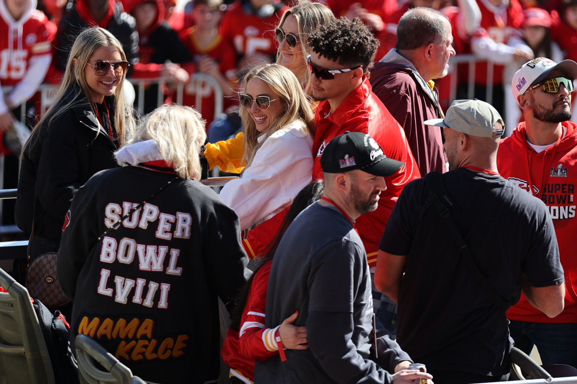 Kansas City Chiefs quarterback Patrick Mahomes (15) celebrates with Brittany Mahomes and Donna Kelce on the bus in the parade during the celebration of the Kansas City Chiefs winning Super Bowl