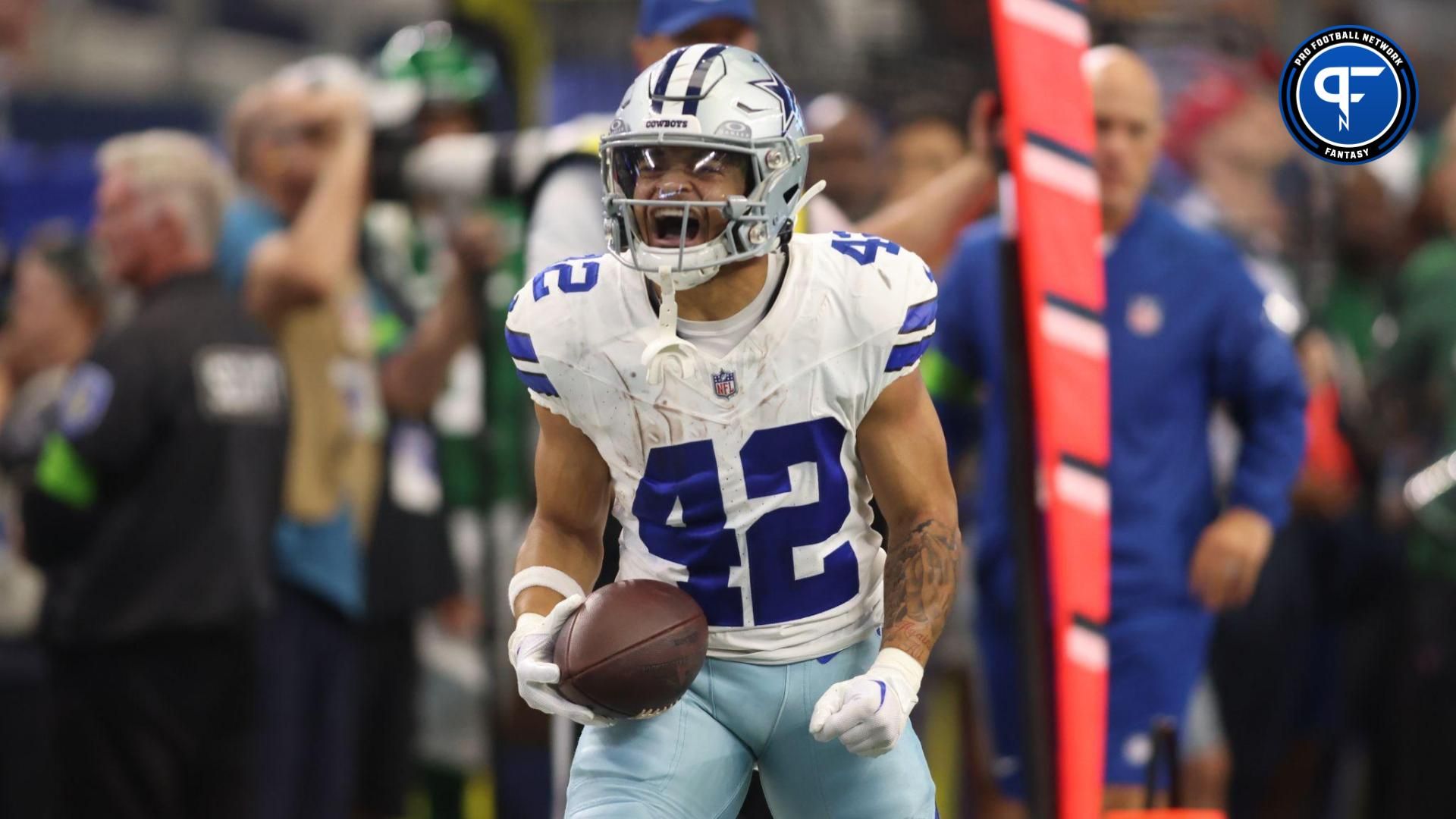 Dallas Cowboys running back Deuce Vaughn (42) reacts after making a first down in the second quarter against the New York Jets at AT&T Stadium.